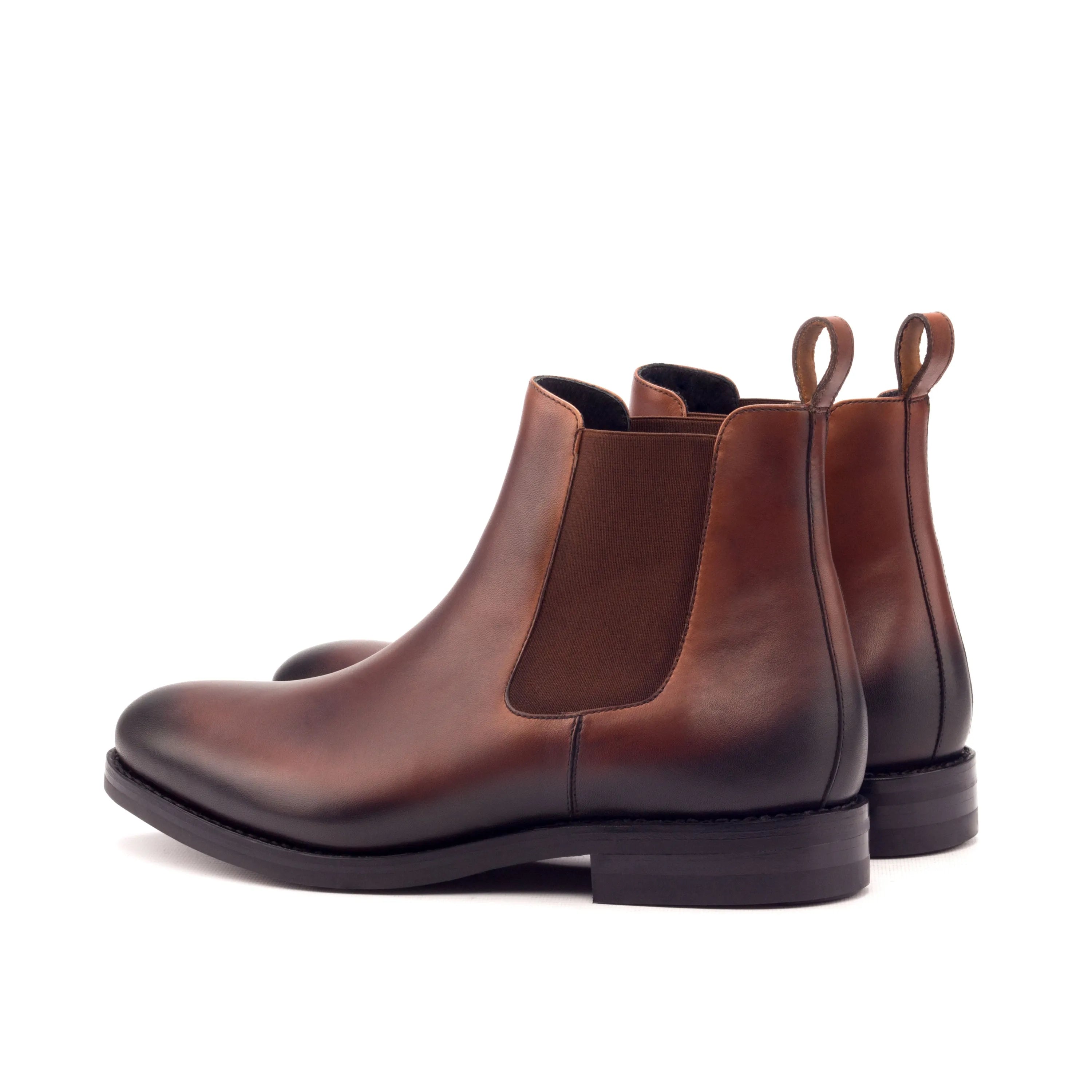 Pair of brown leather Chelsea Boots, showcasing the stylish Gall Chelsea Boots design