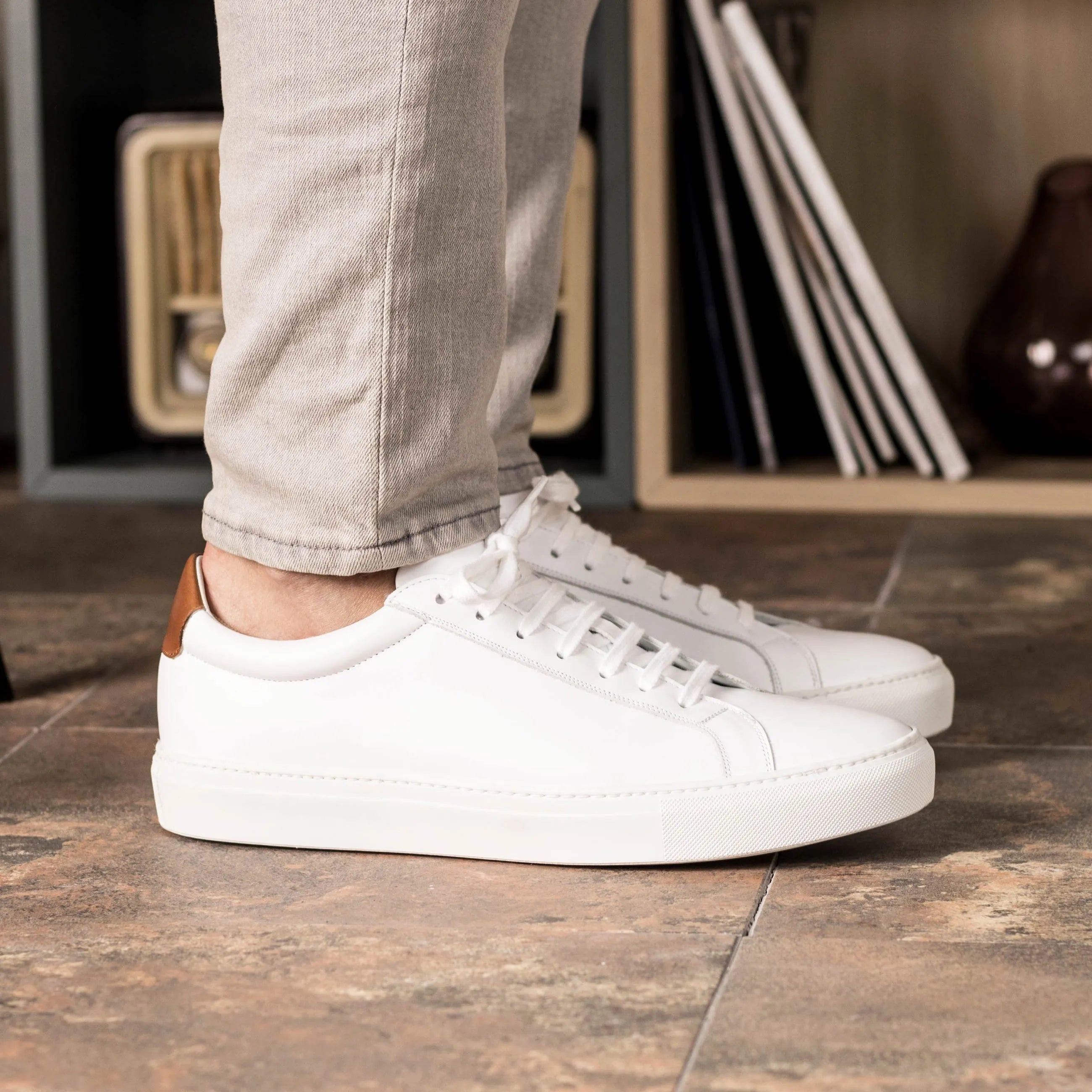 White leather Garry Low Kick Sneakers showcased in a Fast Lane style