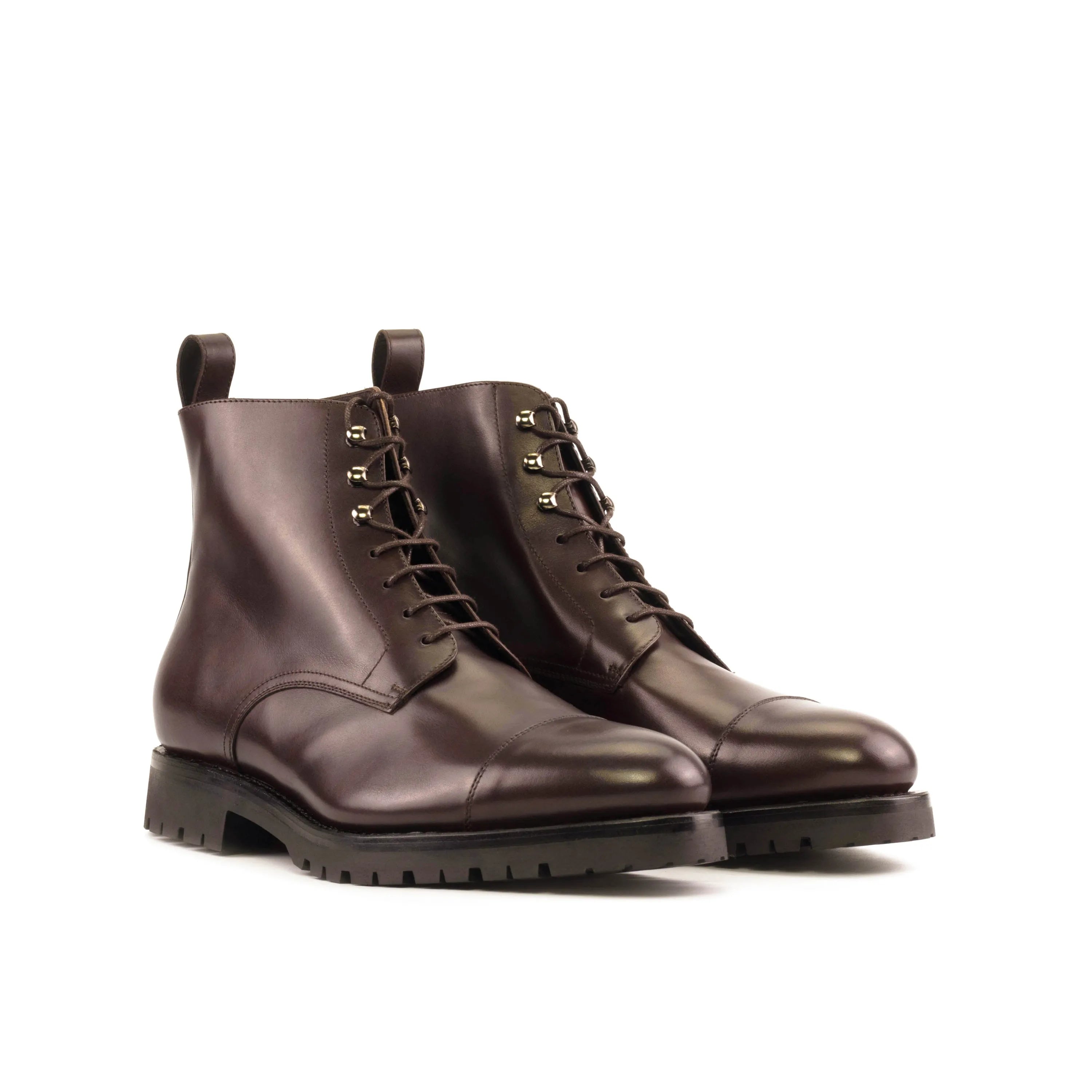 Pair of brown leather lace-up Geeva Jumper Boots for stylish footwear in the Fast Lane