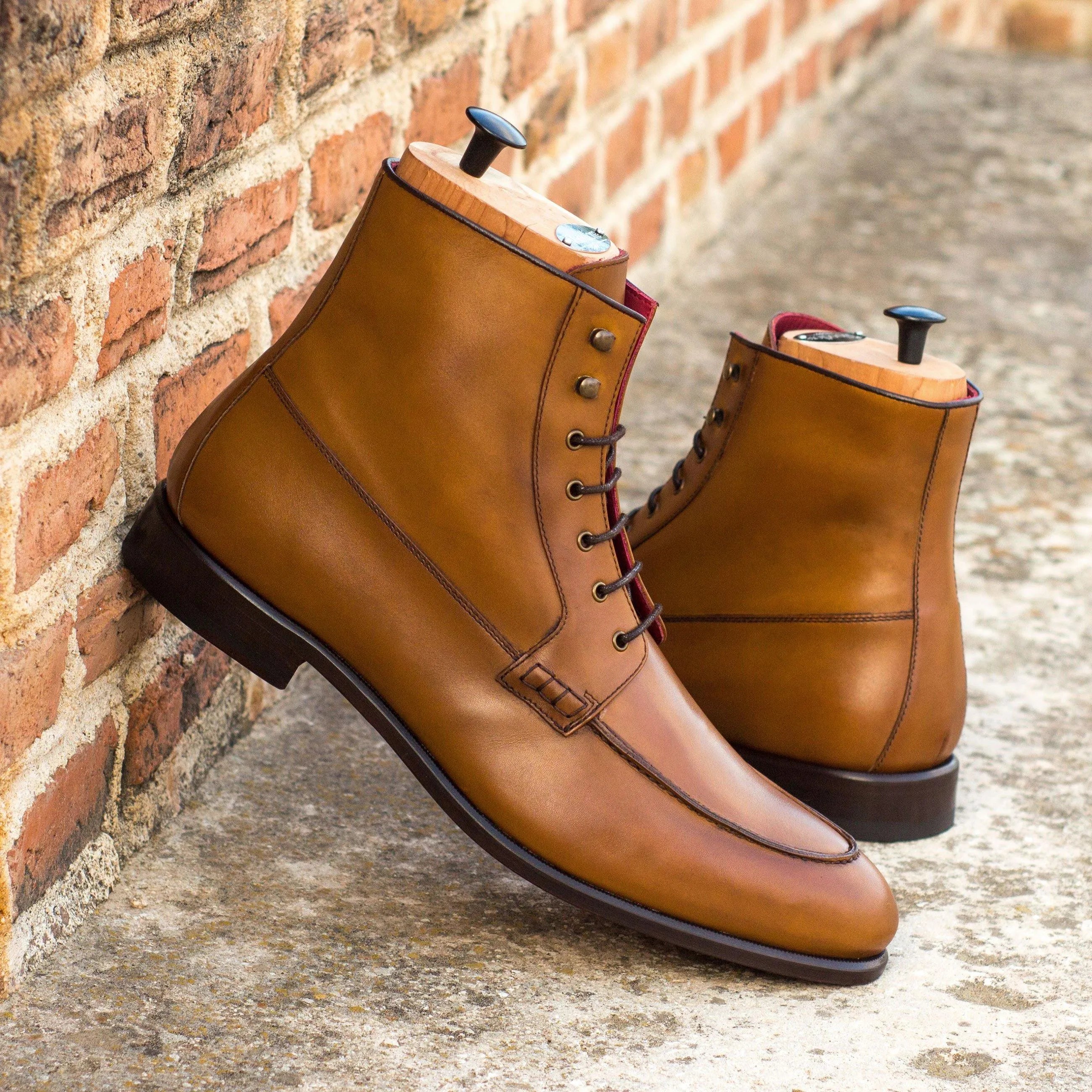 Brown leather lace-up boots, showcasing the stylish Georgino Moc Boot design