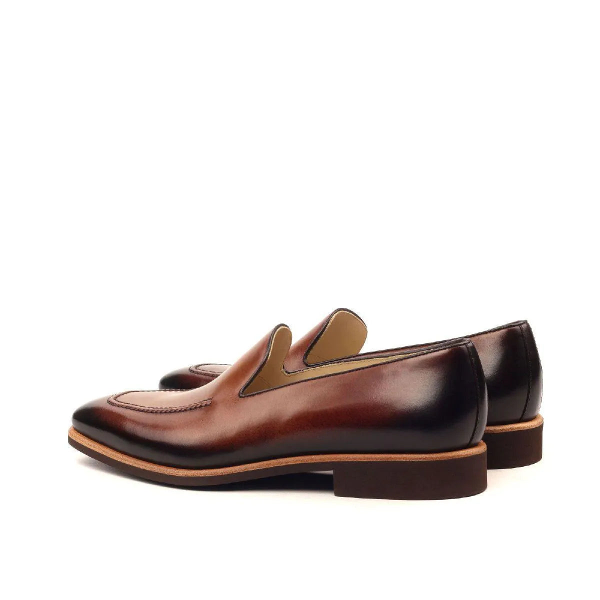 Pair of brown leather loafers featured in Gold Loafers collection with brown painted calf