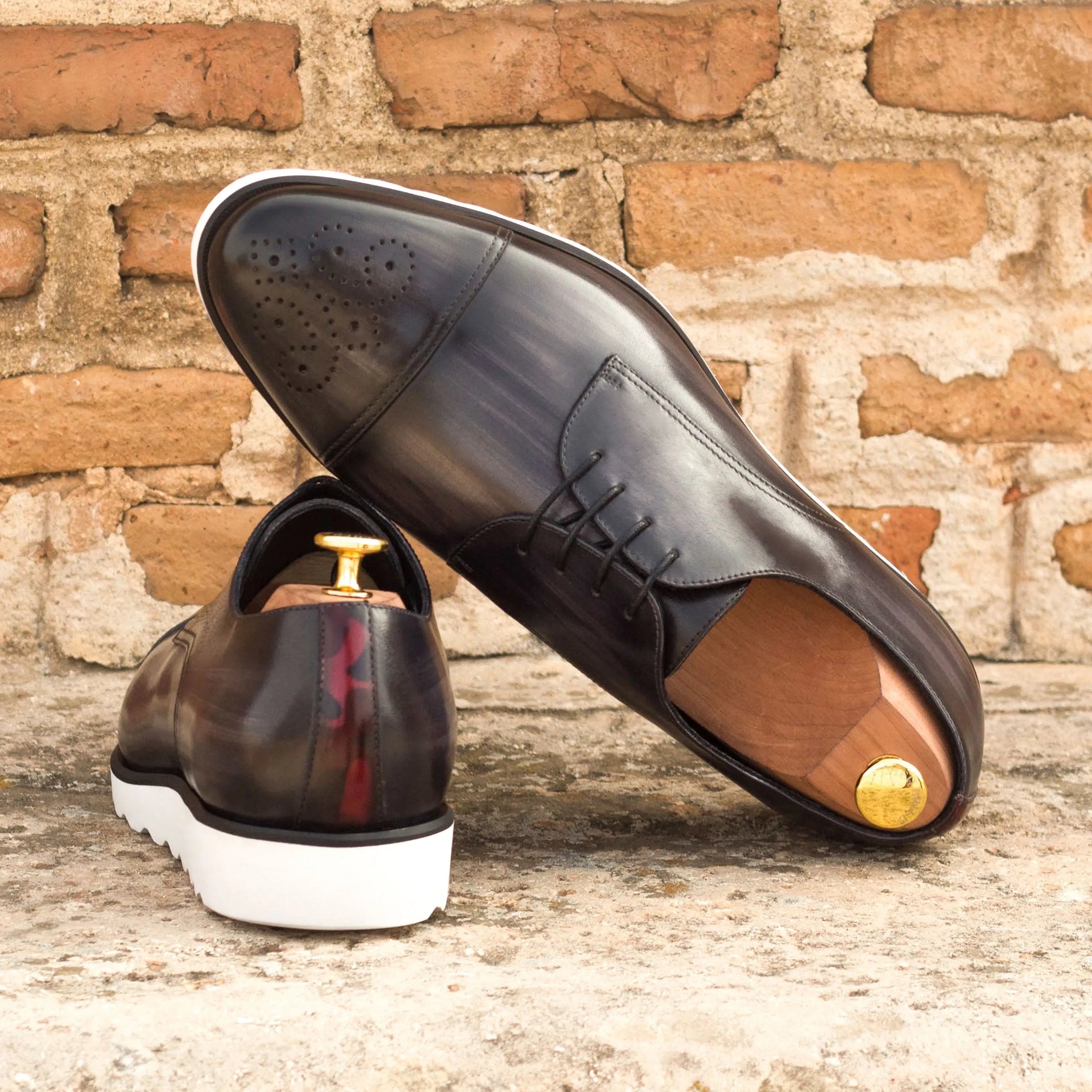 Gray Griffith Patina Derby shoes with stylish white soles for a modern look