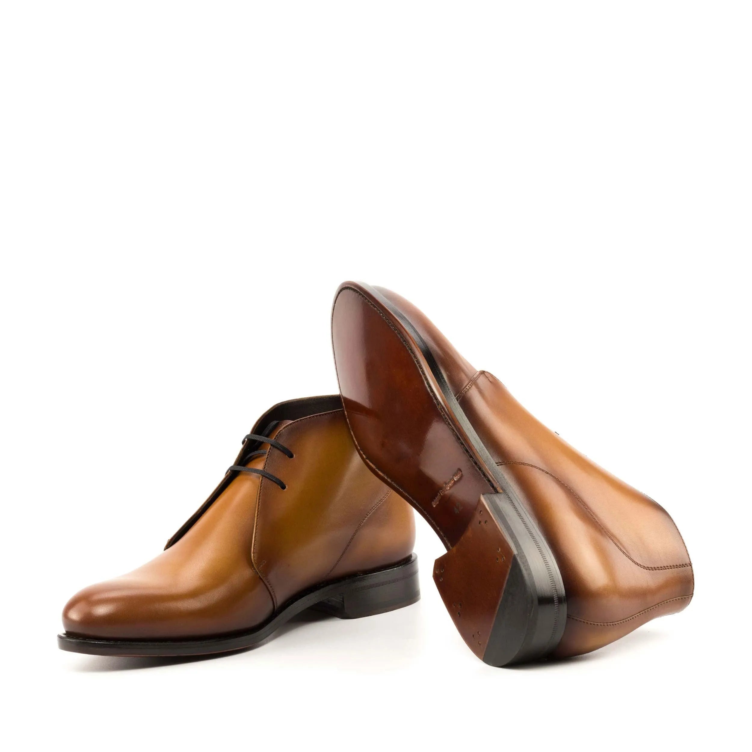 Brown leather Hammond Chukka boots showcasing stylish design and comfort. Fast Lane collection