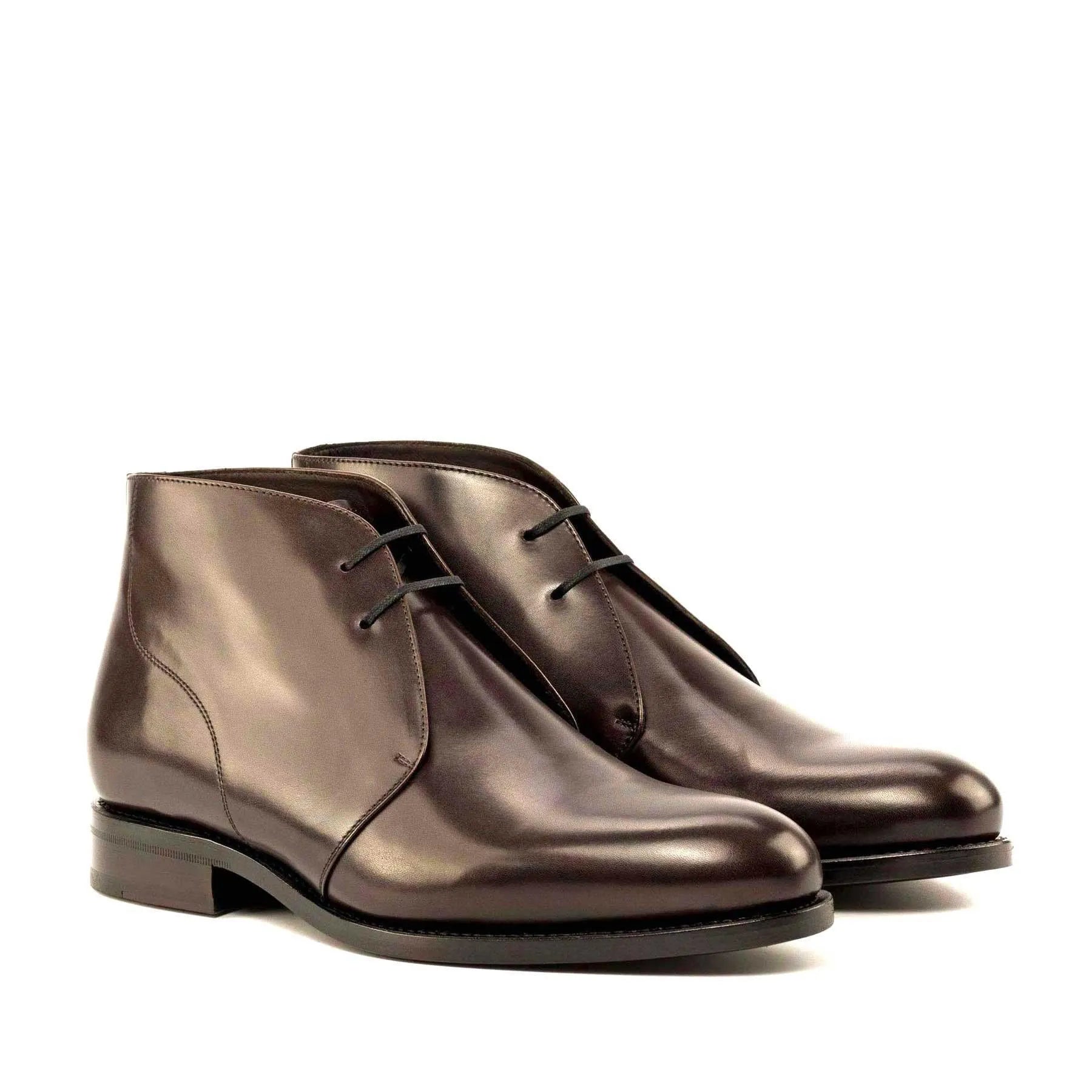 Pair of brown leather Hawa Chukka boots for stylish and comfortable footwear