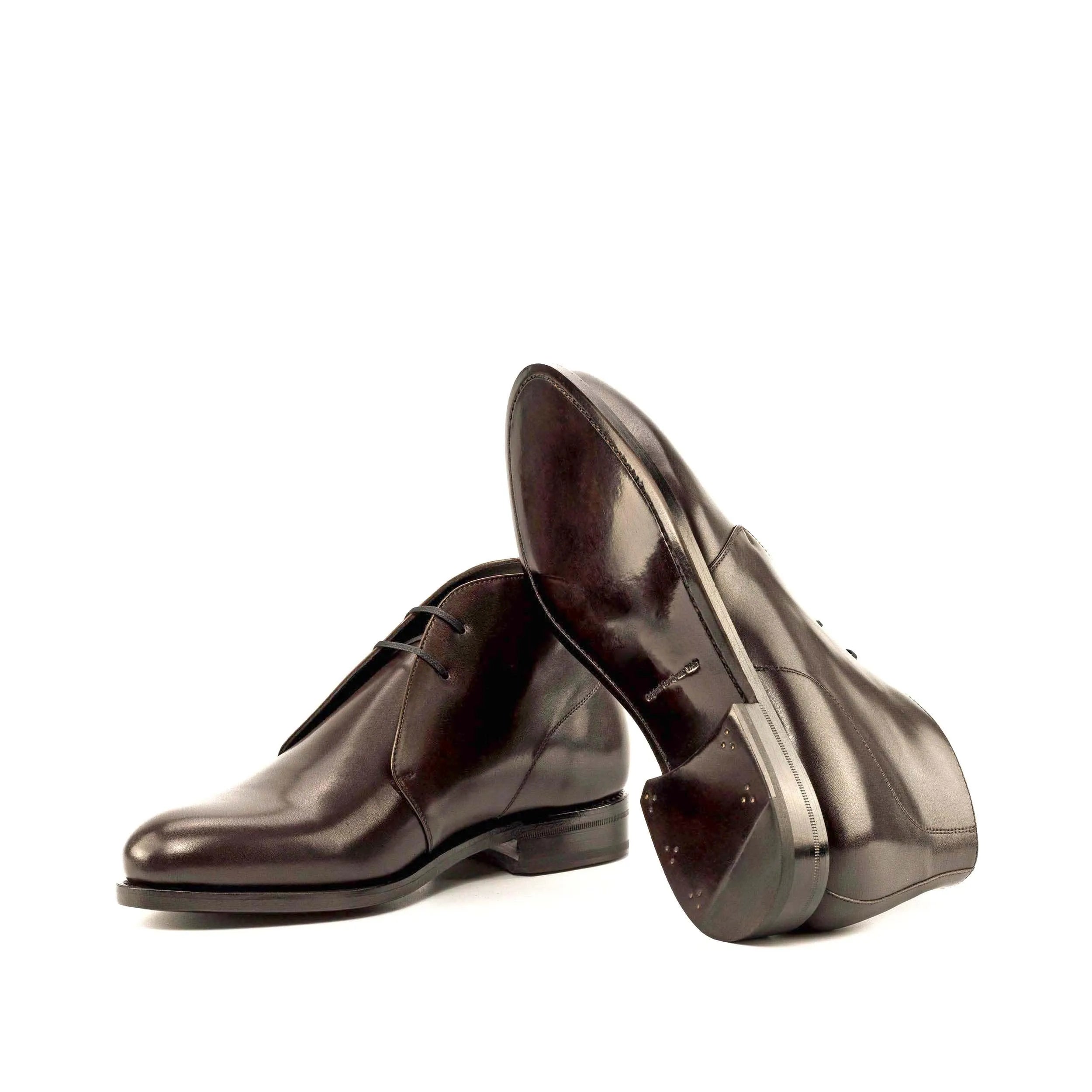 Shiny brown leather Hawa Chukka Boots showcasing elegant style and sophistication