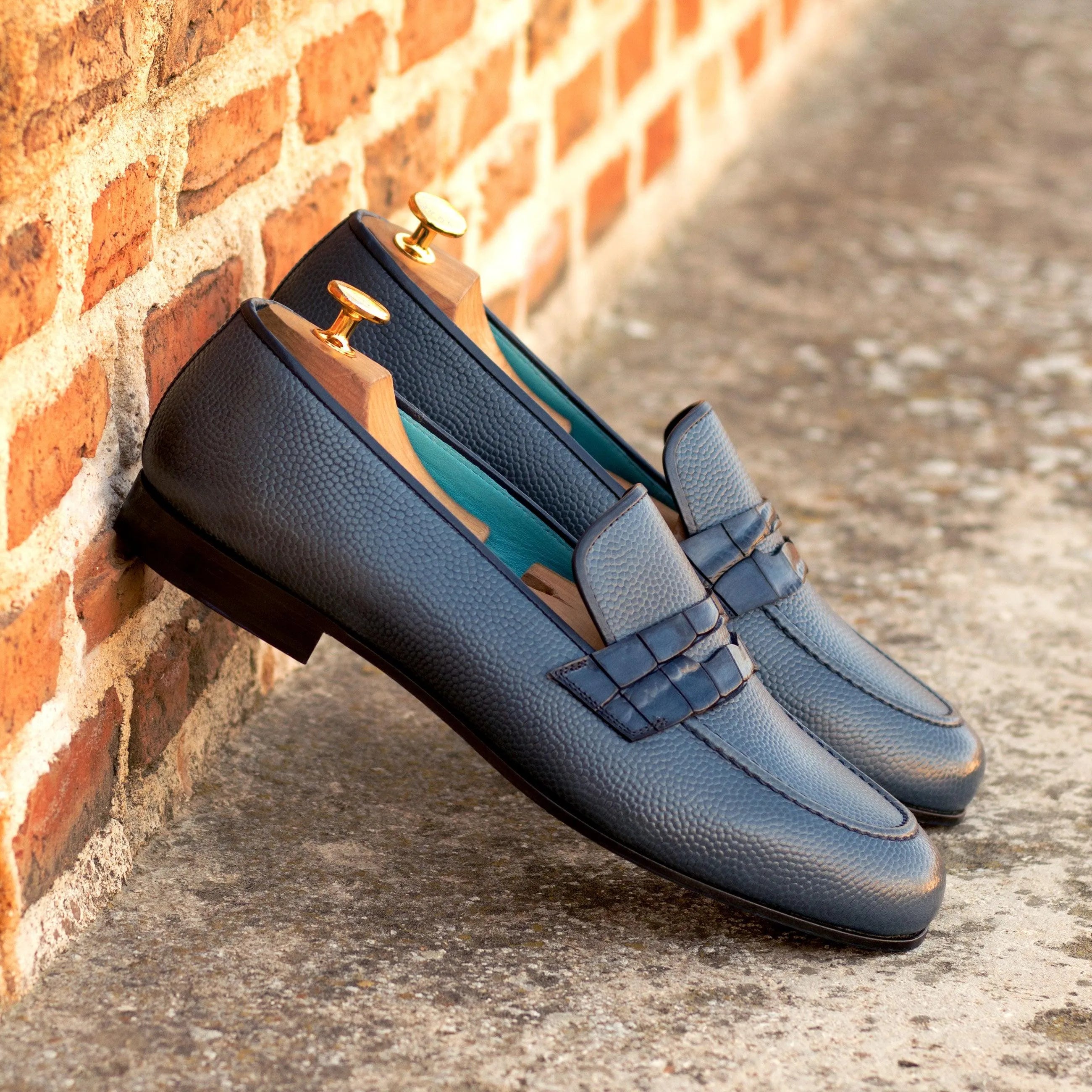 Blue leather penny loafers from the Hefe Wellington slip collection