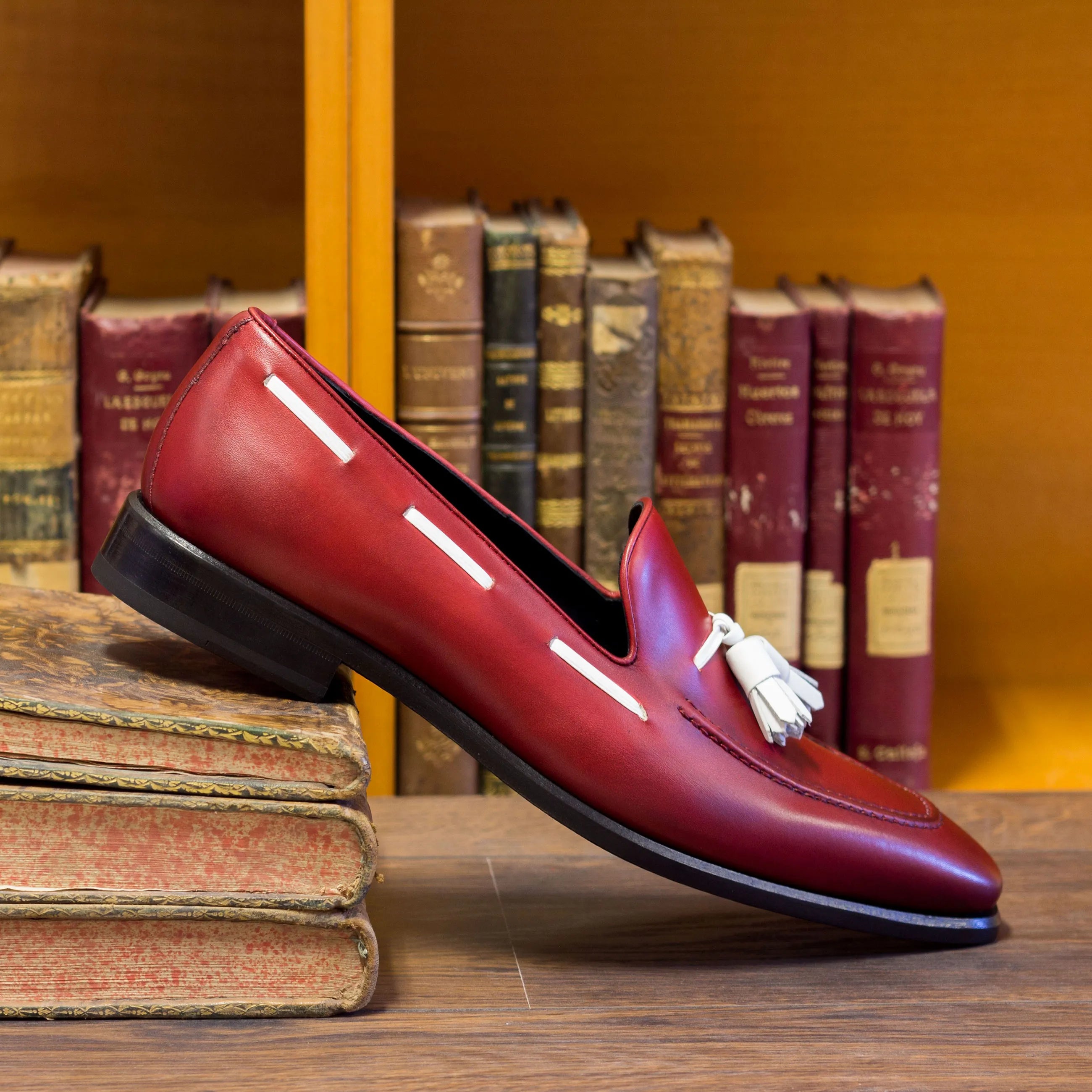 Red leather tassel loafer from Icarus Loafers, luxury bespoke shoes for men