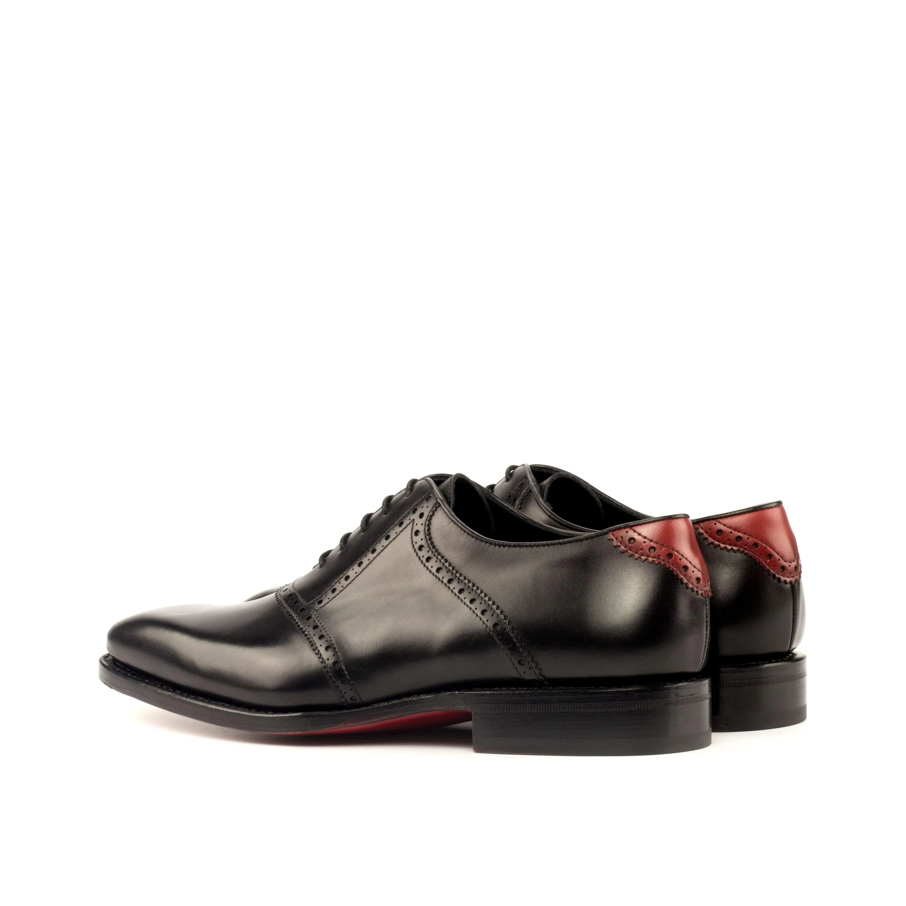 Black leather Iron Saddle shoes featuring stylish red accents for a sophisticated look