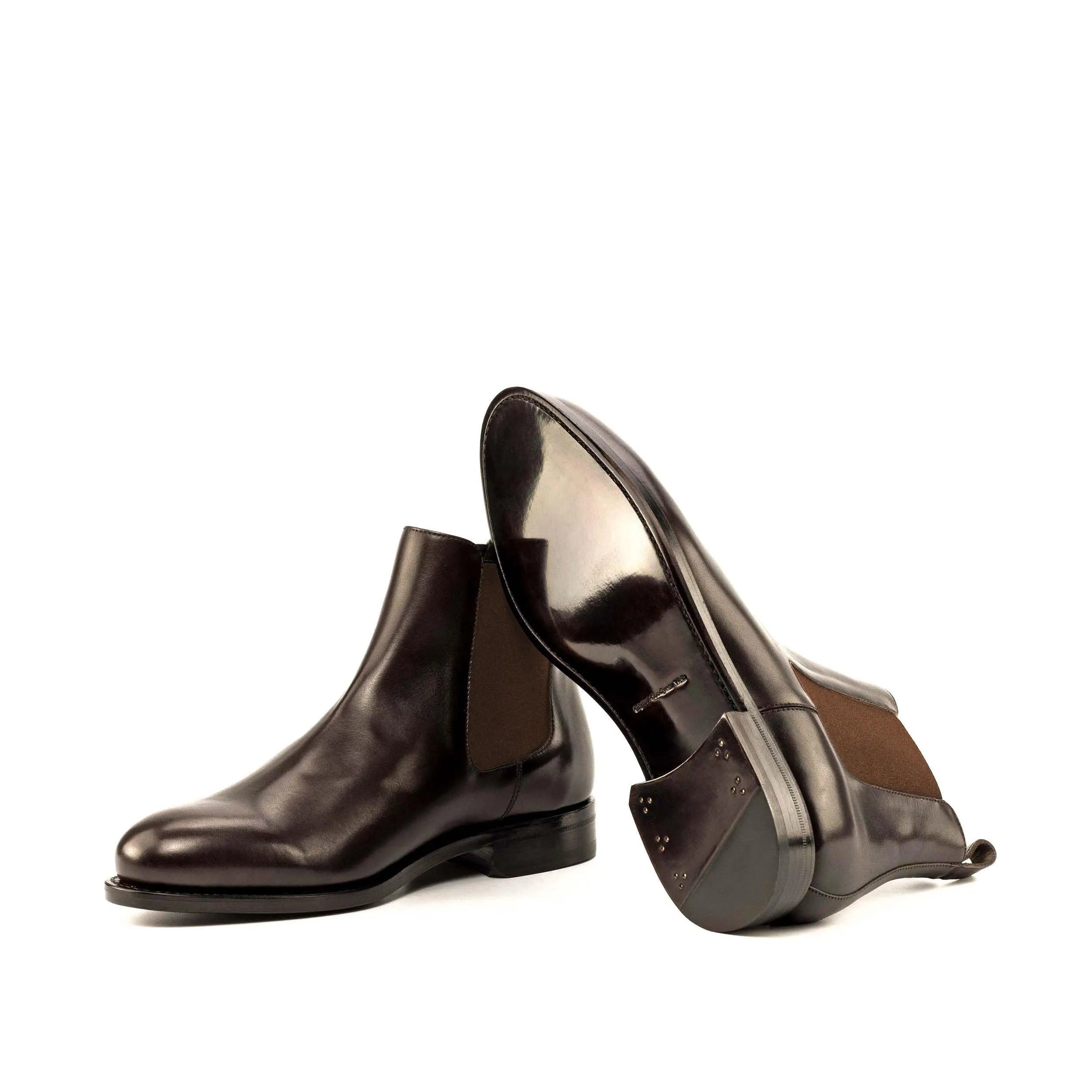 Pair of brown leather Jackson Jr Chelsea boots showcasing fast lane style and elegance