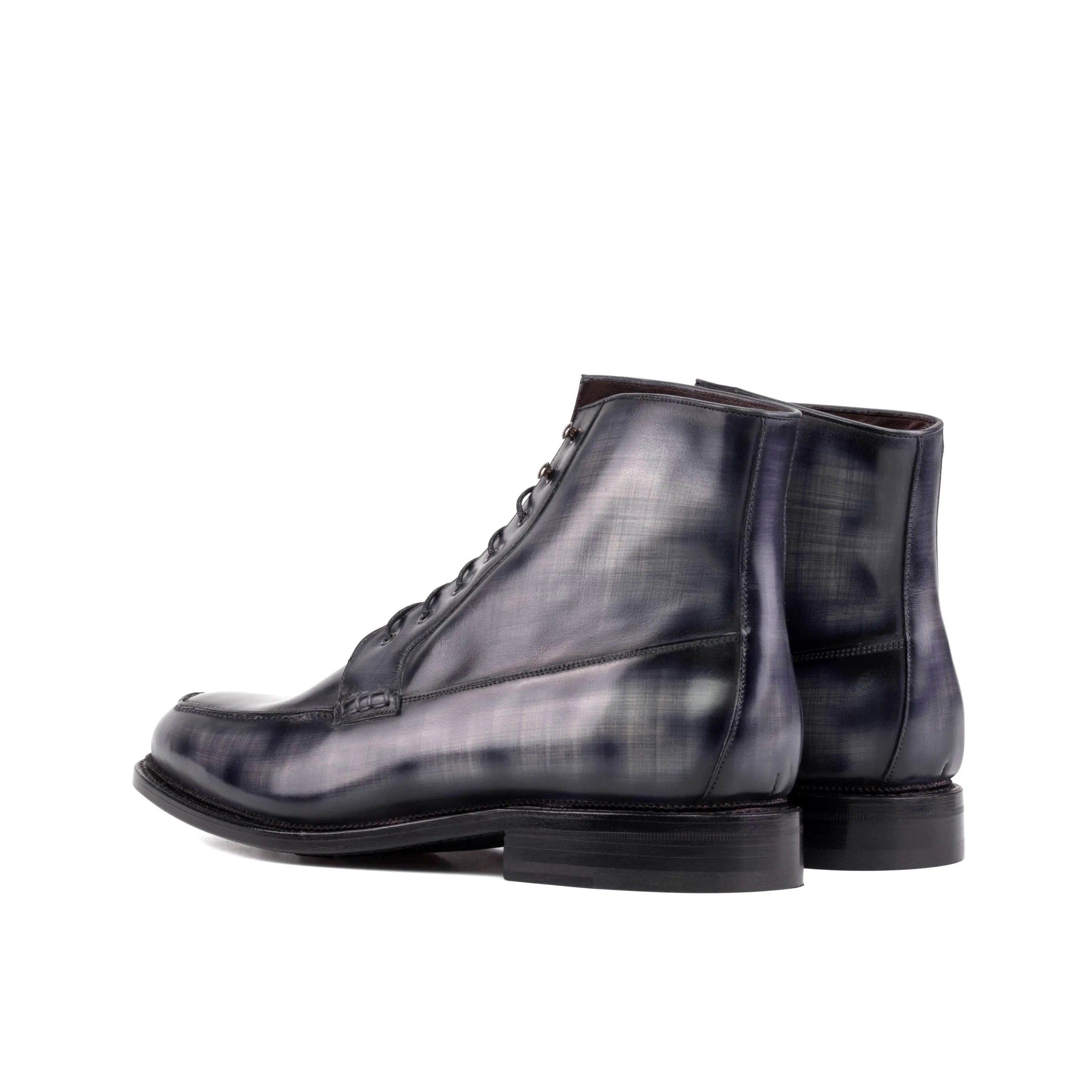 Pair of gray leather Jarvis Patina Moc Boots showcasing elegant design and craftsmanship