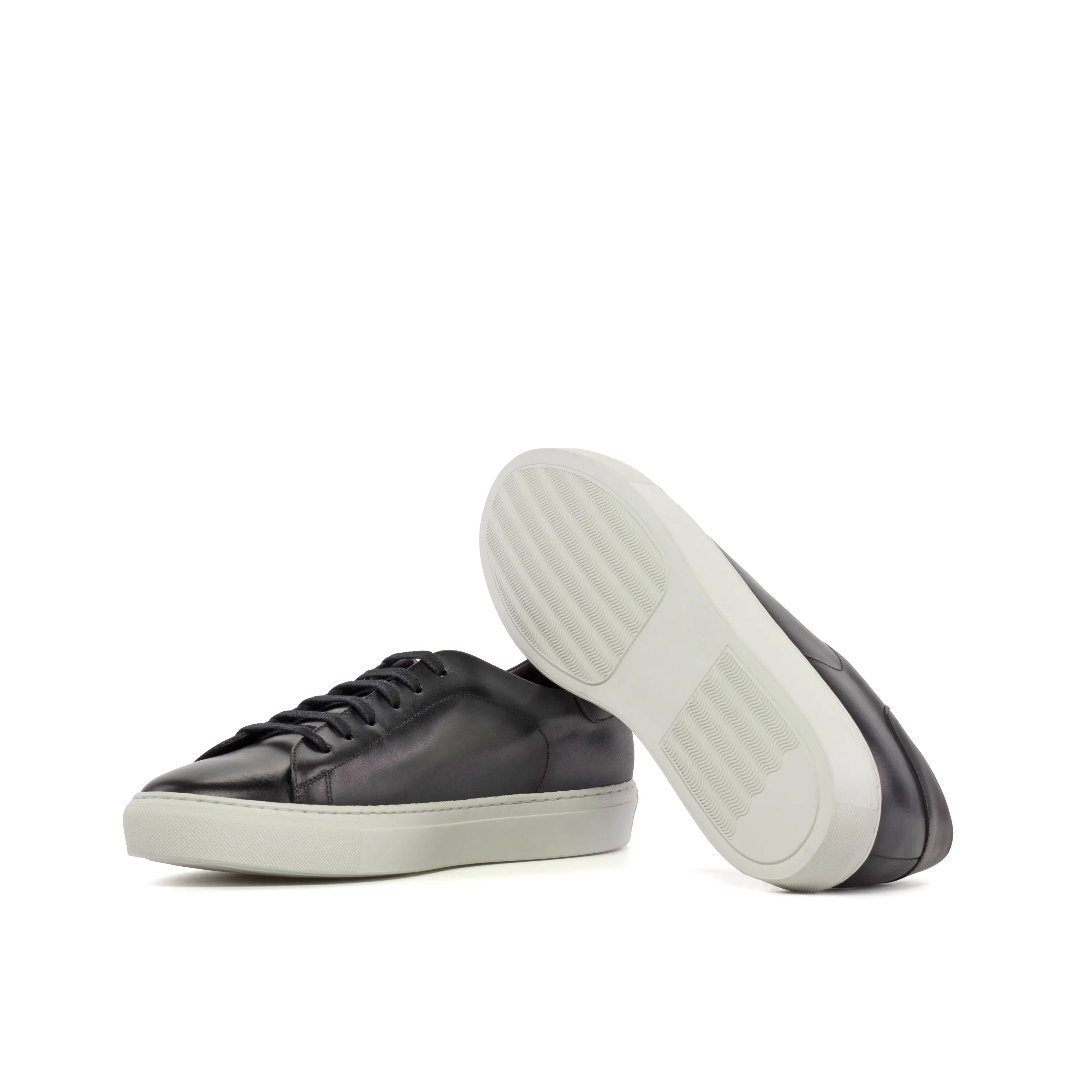 Black leather Java Trainer Sneaker featuring white cupsole for stylish comfort