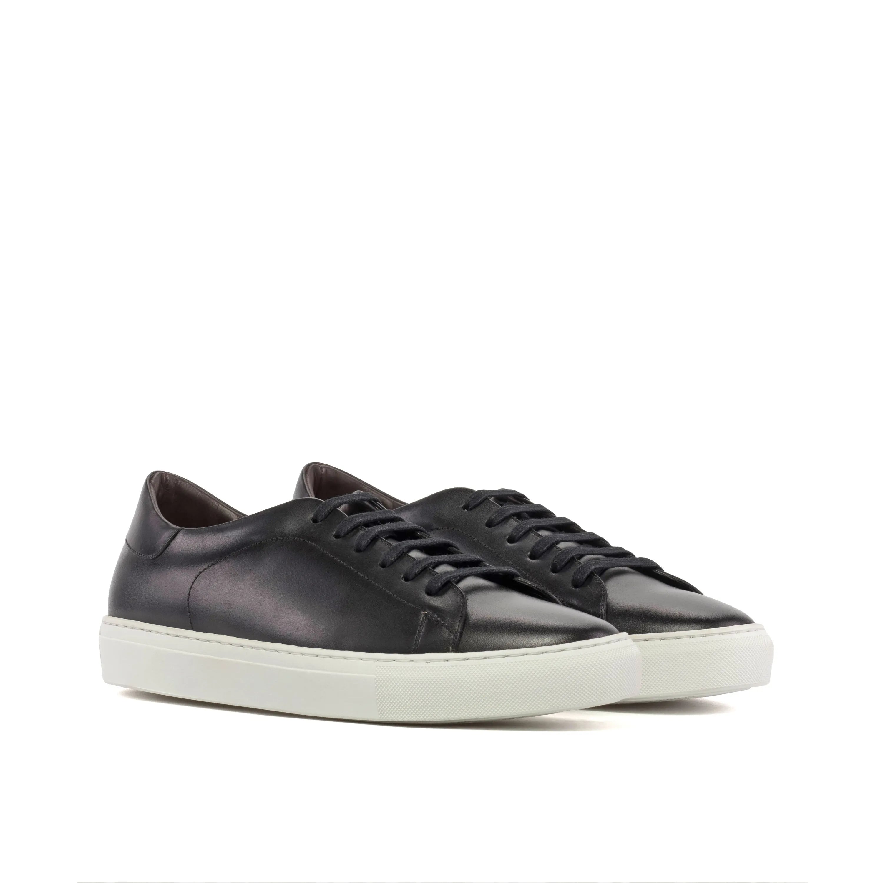 Black leather Java Trainer Sneakers featuring white cupsoles for a fast lane style