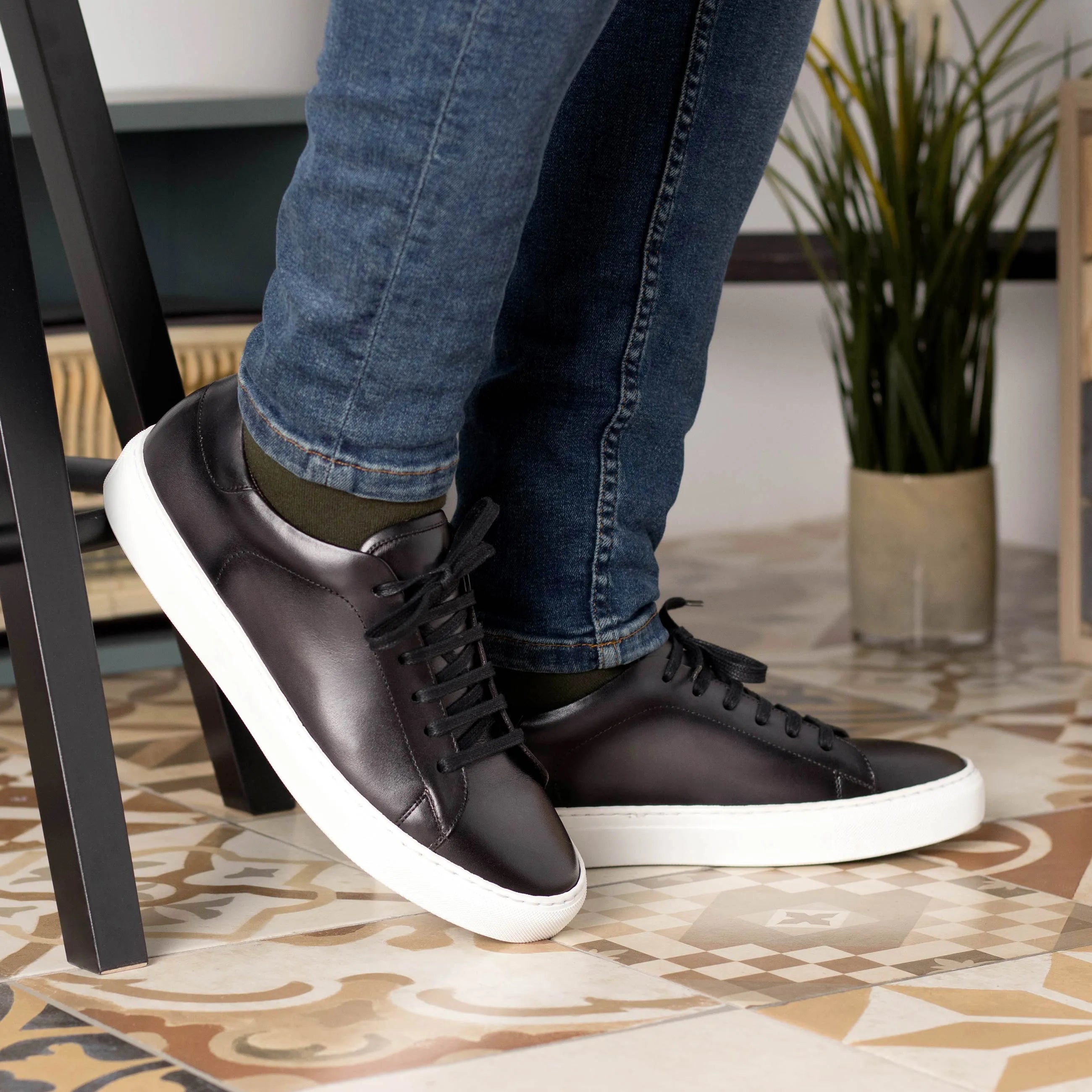 Black leather Java Trainer Sneaker with white cupsole for a stylish fast lane look