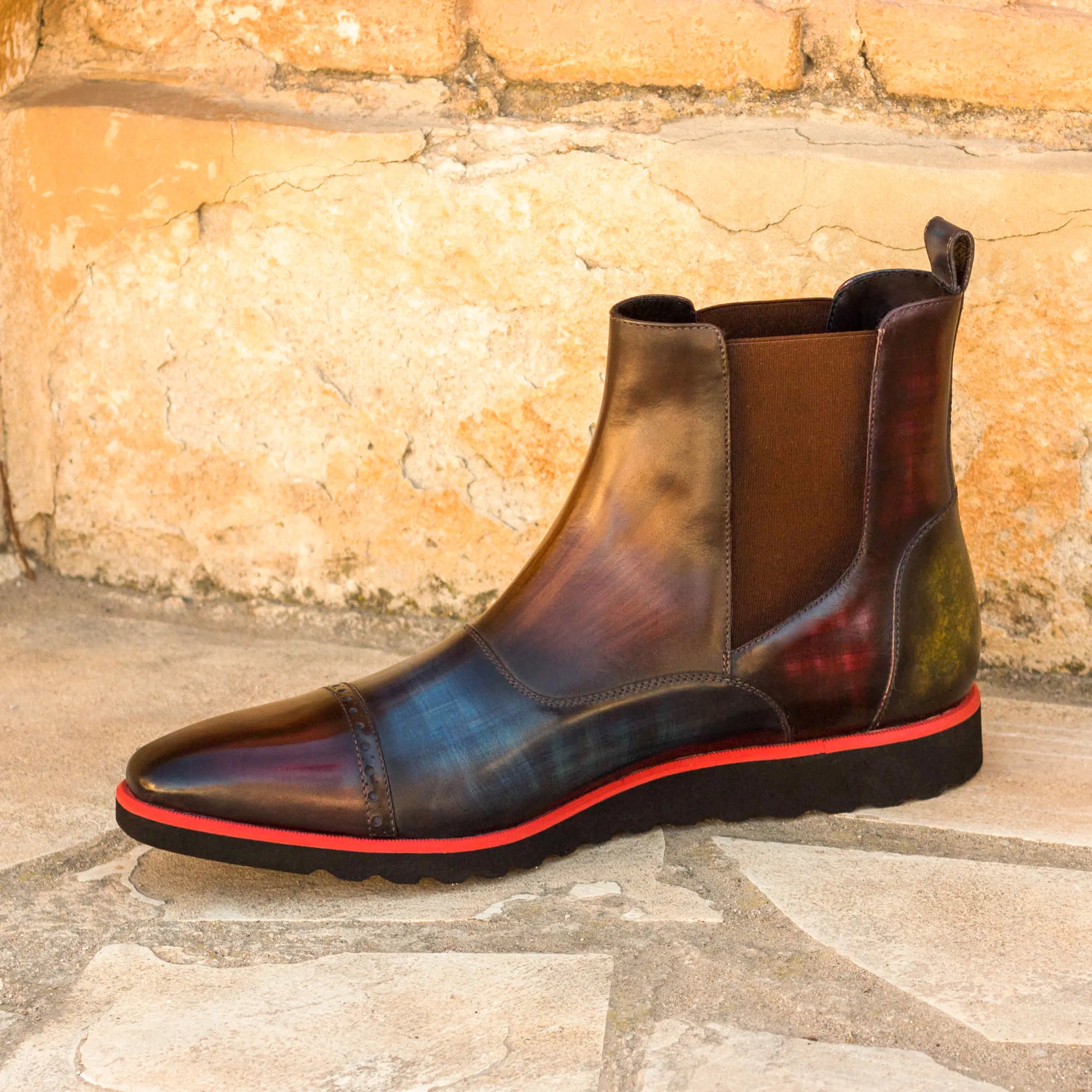 Leather Javier Patina Chelsea Boots featuring a striking red accent for stylish flair