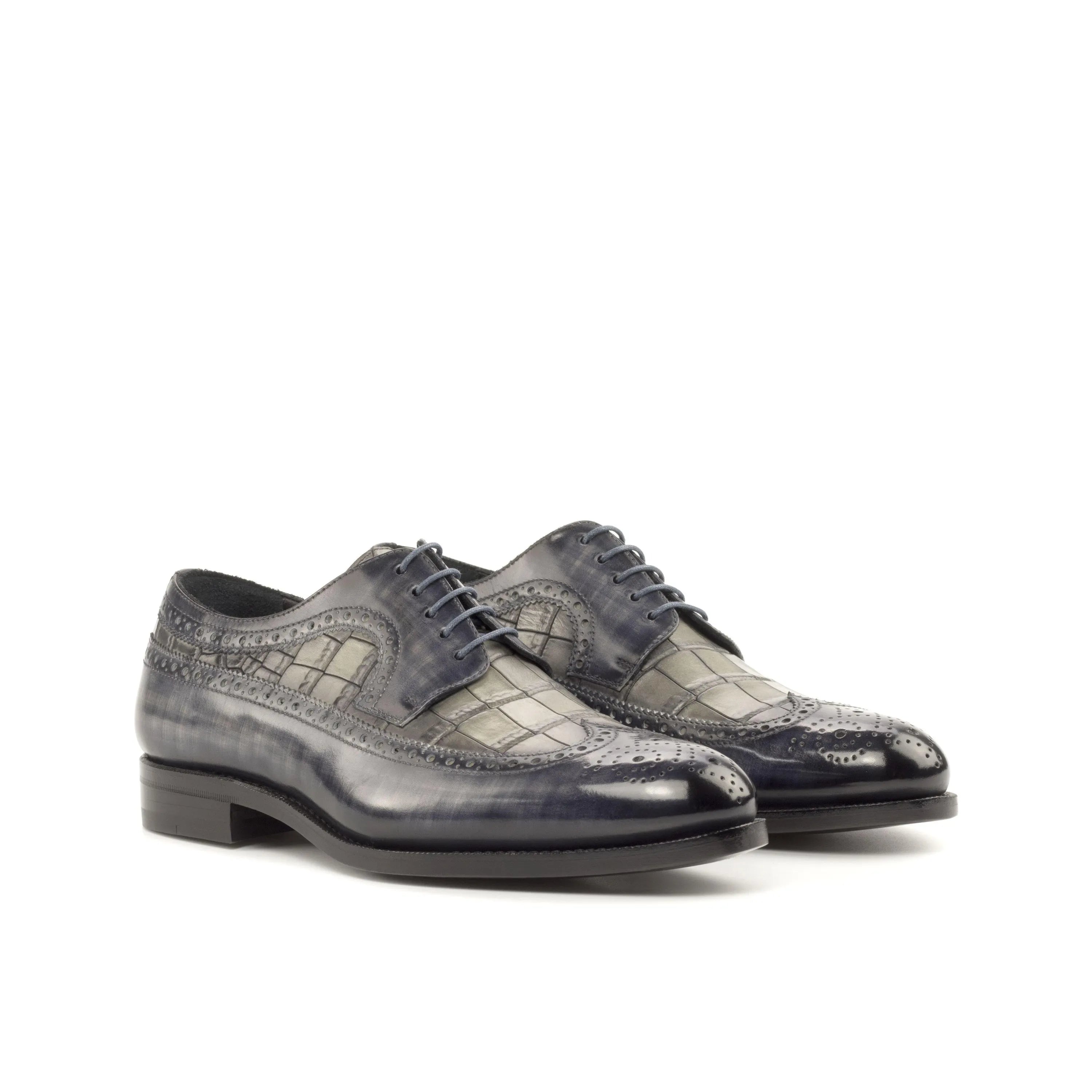 Pair of gray leather Javis Patina Longwing Blucher dress shoes with long wingtip design