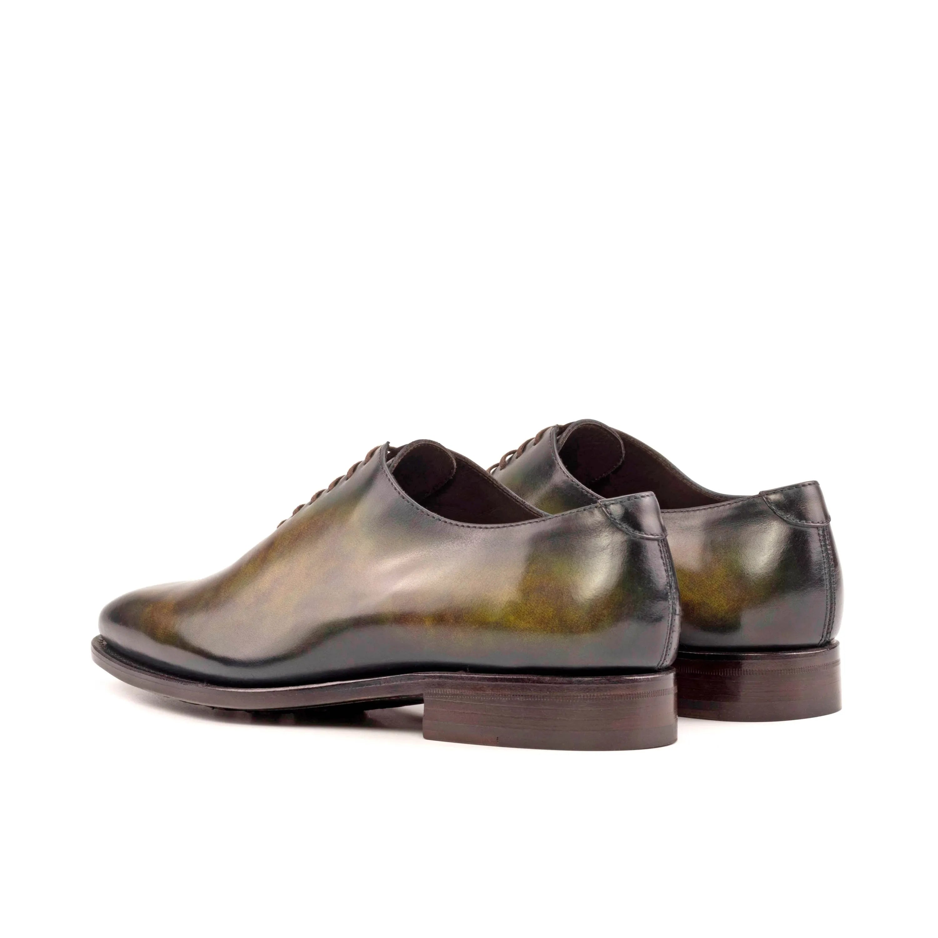 Pair of green leather Javn Patina Wholecut shoes for elegant formal wear