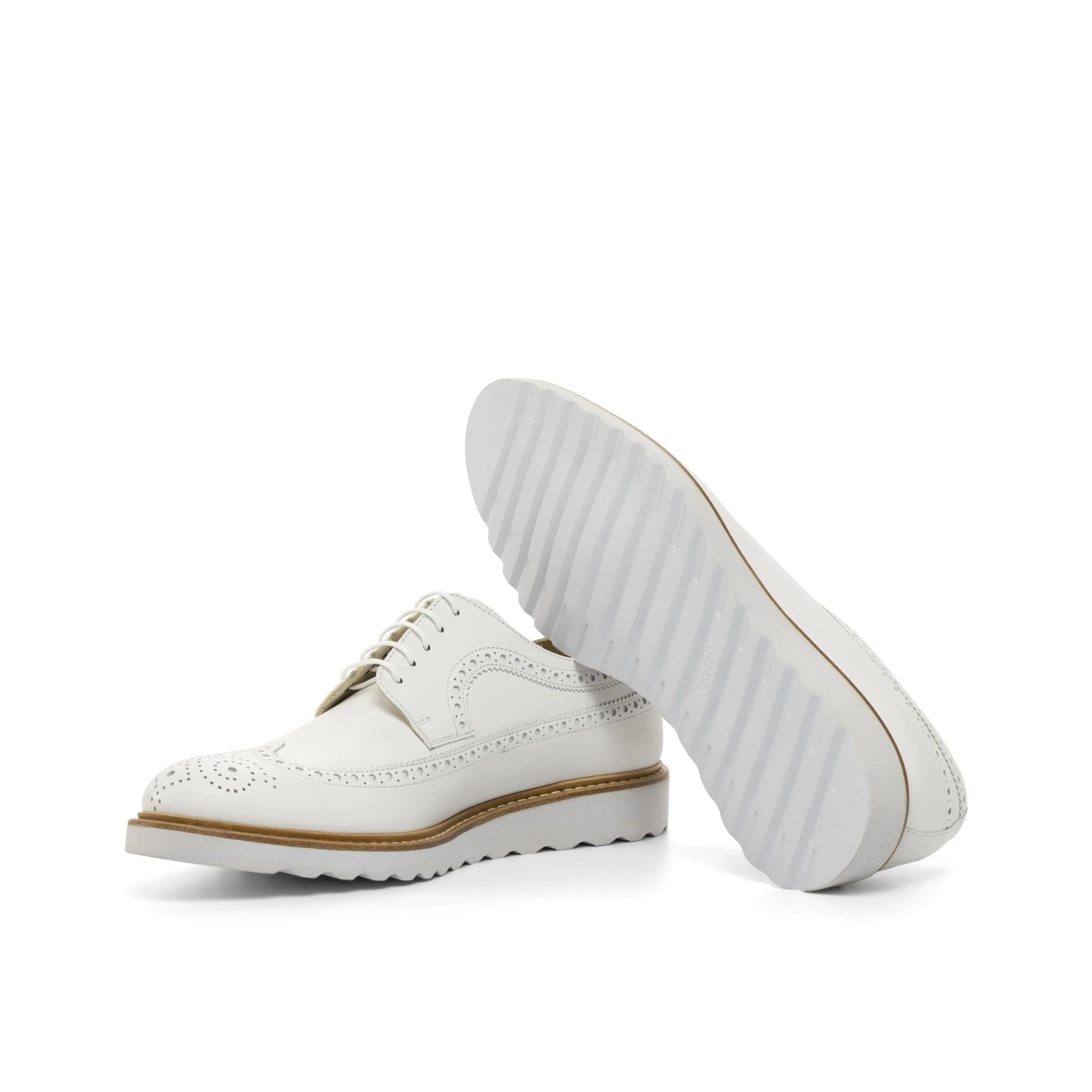 White leather Jay Longwing Blucher shoes featuring elegant wingtip design
