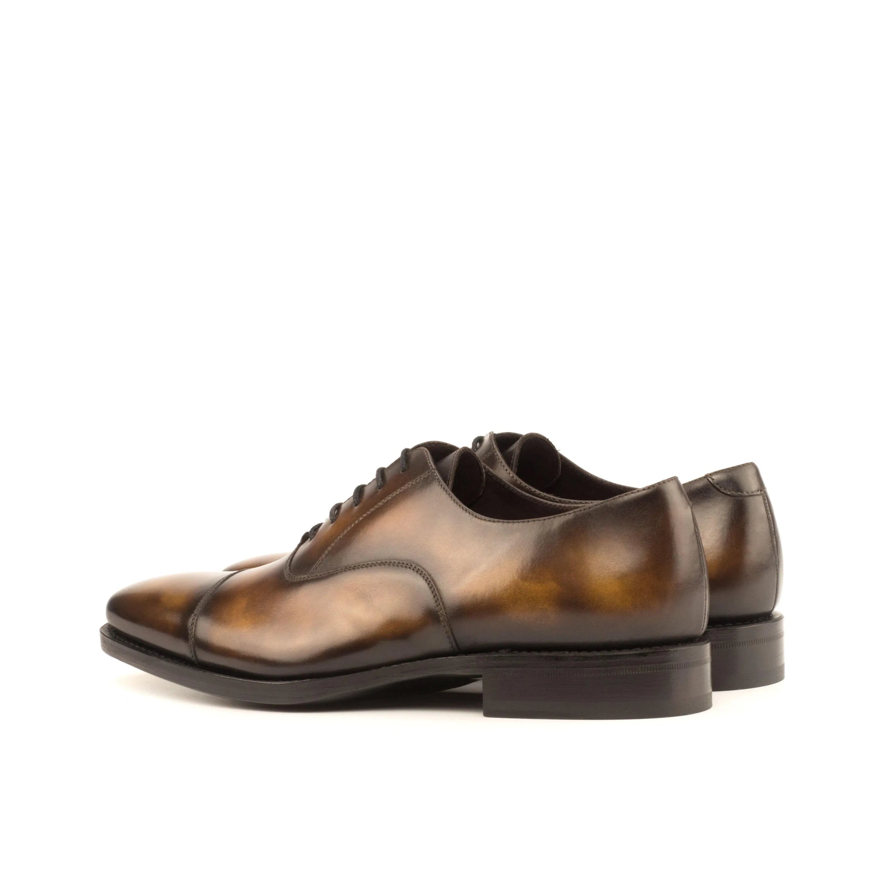 Pair of brown leather Jeriko Oxford Patina shoes for formal occasions
