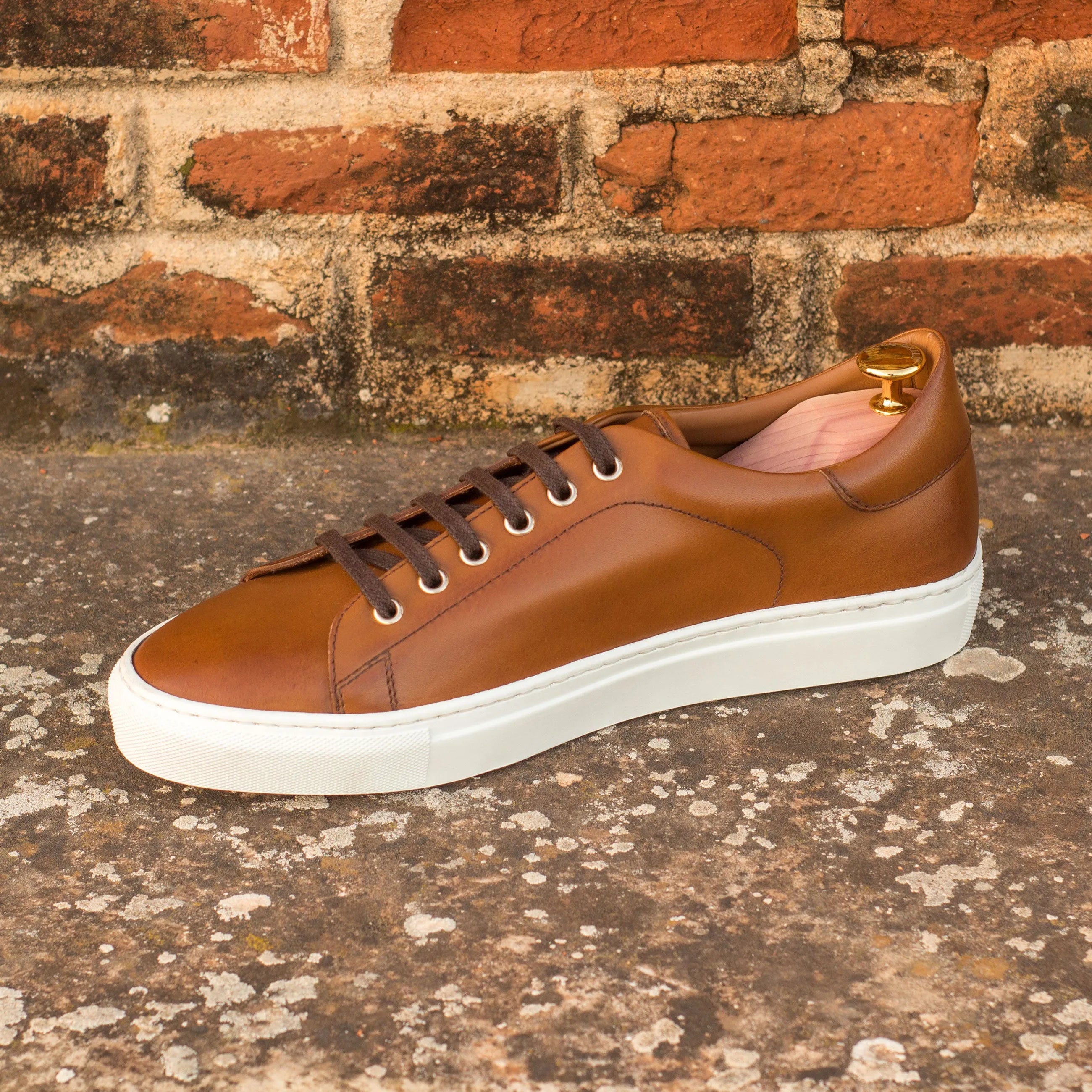 Brown leather Jero Trainer Sneakers featuring a classic white cupsole for stylish comfort