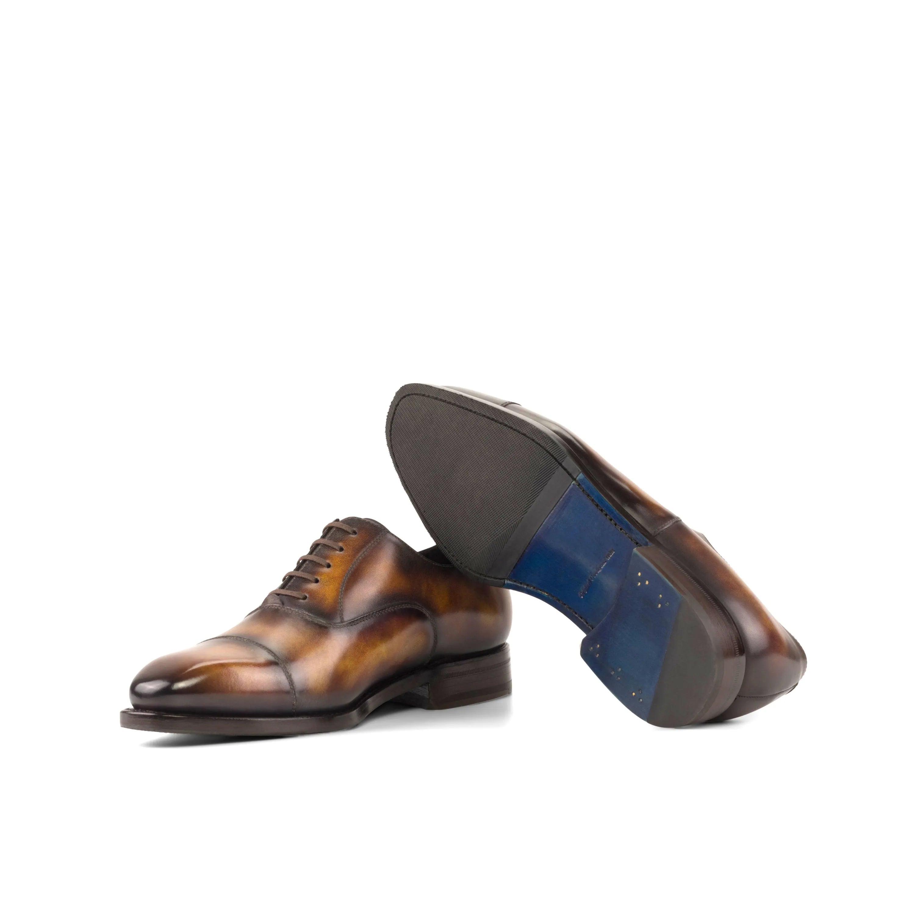 Brown leather Jiniva Patina Oxford shoes showcasing elegant craftsmanship and style