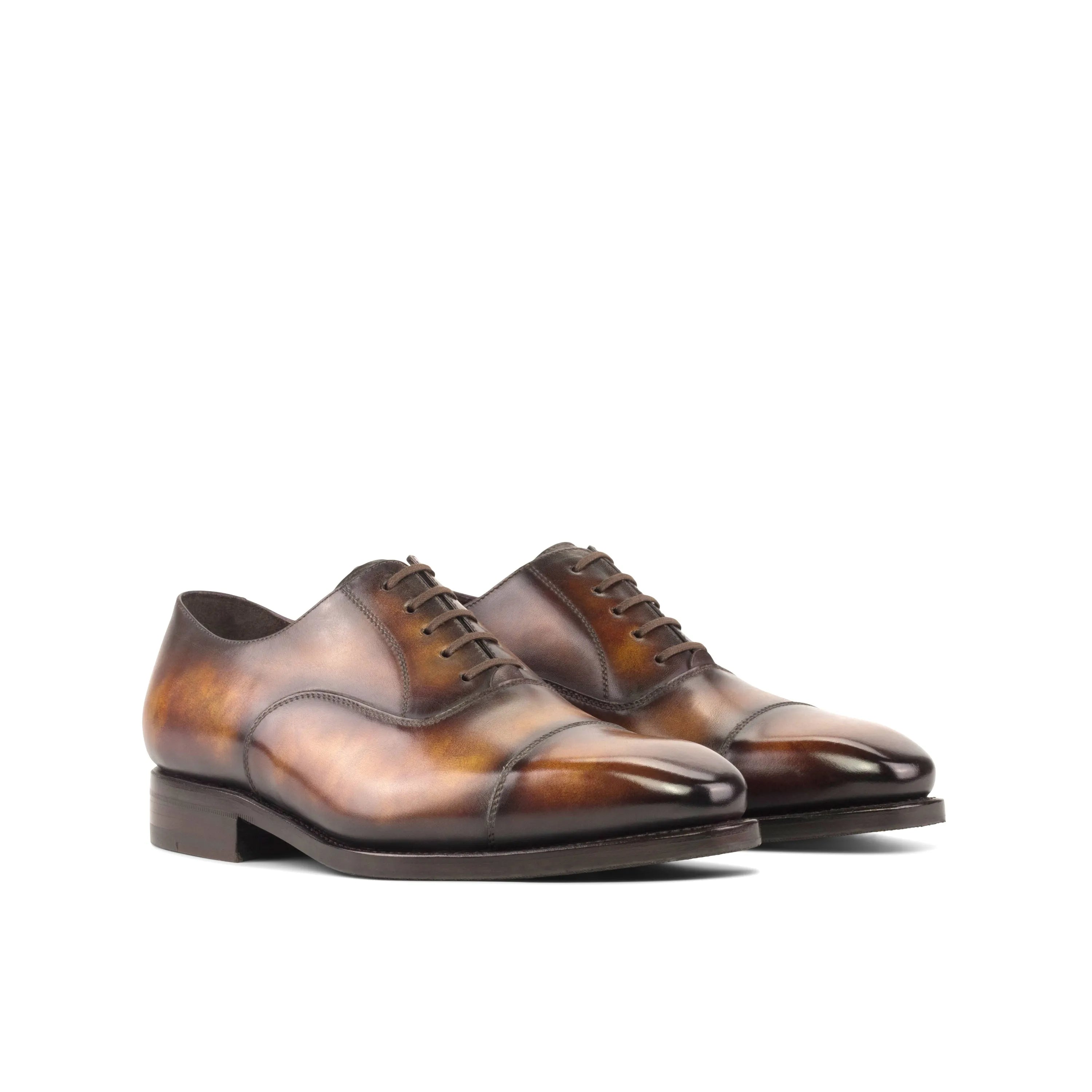 Brown leather Jiniva Patina Oxford shoes showcasing elegant craftsmanship and style