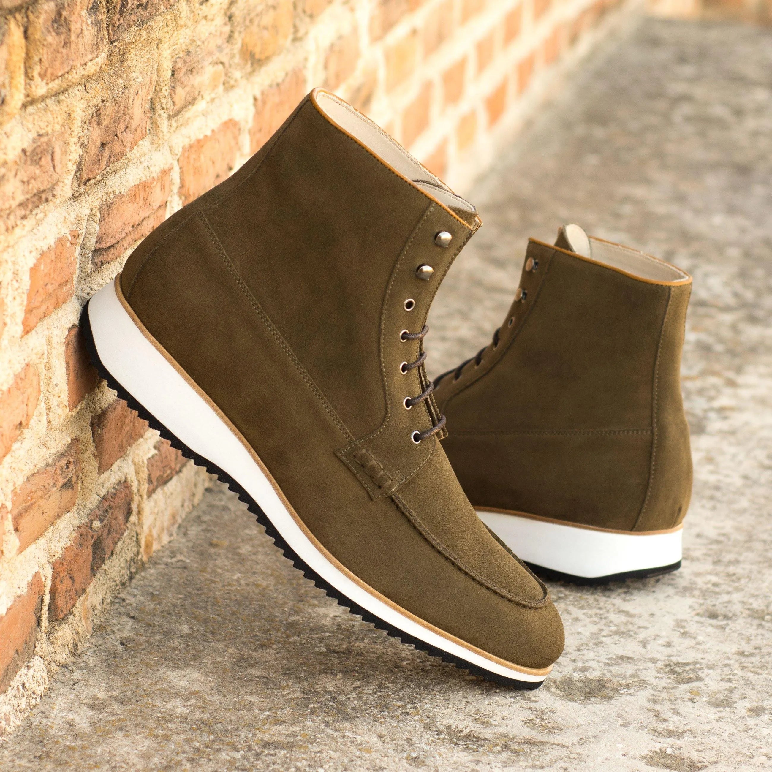 Olive suede Jmike Moc Boot showcasing stylish and comfortable ankle boot design