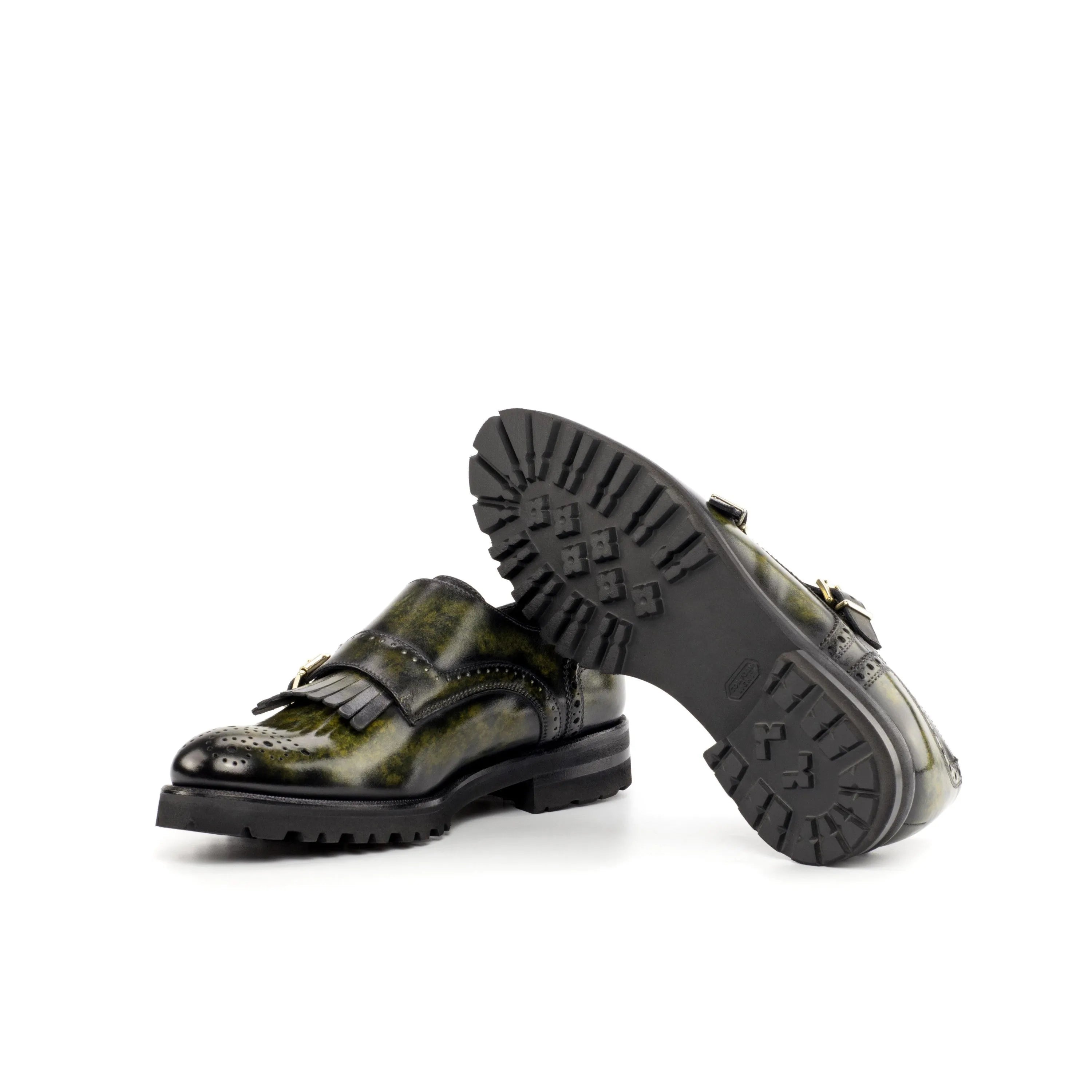 Green leather Juju Kiltie Patina Womens Monk Strap shoes displayed elegantly