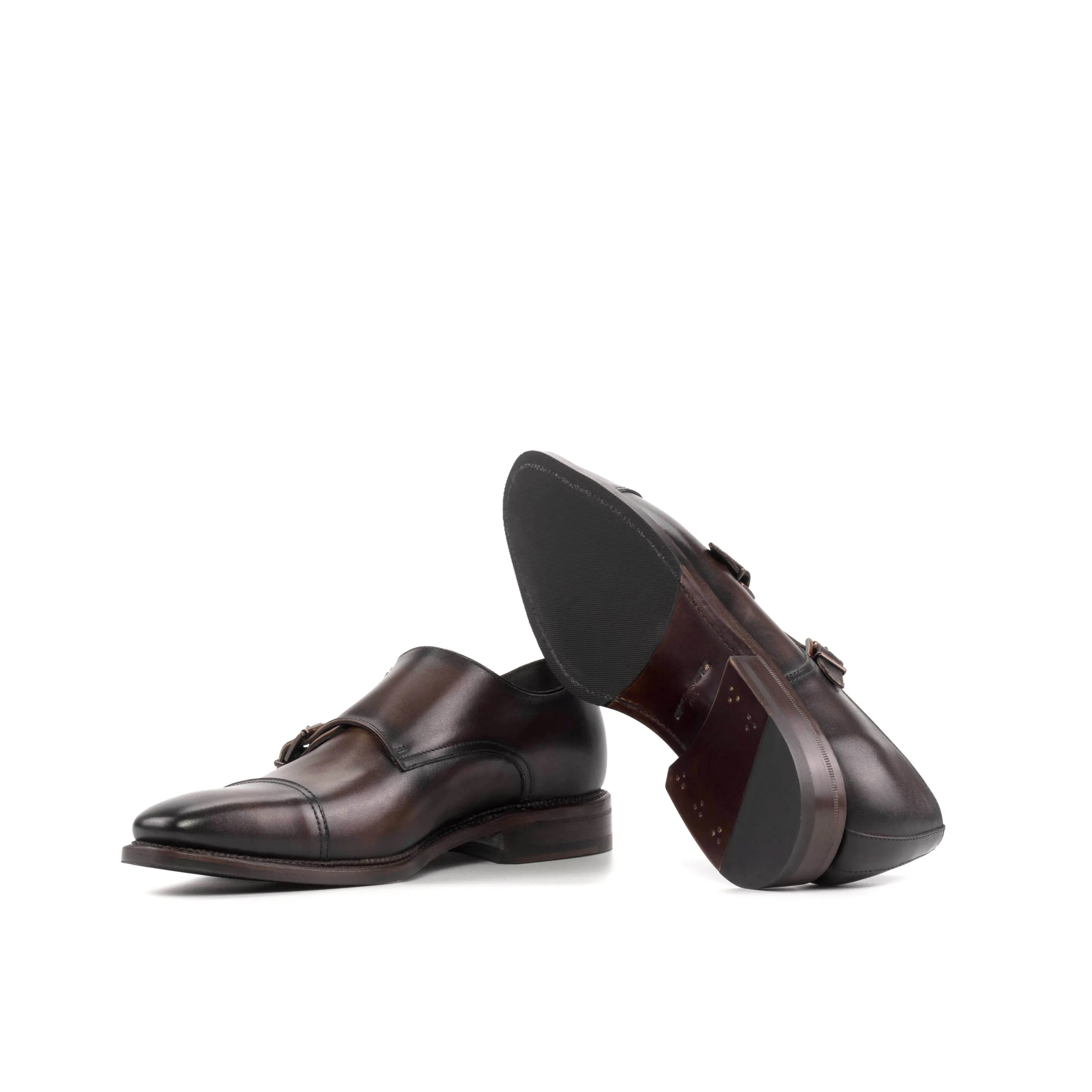 Pair of brown leather Jupiter Double Monk strap shoes, perfect for fast lane business days