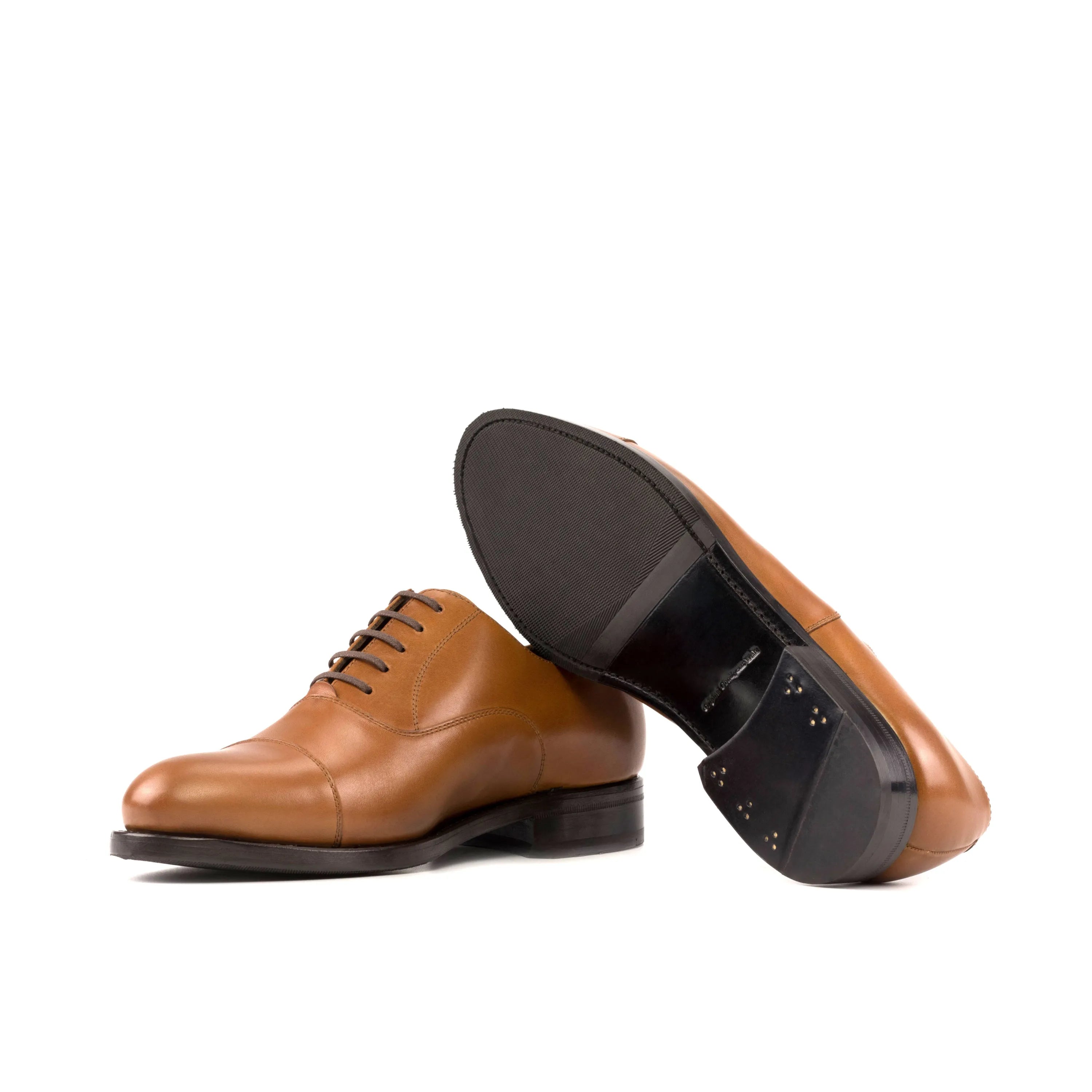 Pair of brown leather dress shoes from Klavio Oxford collection in fast lane style