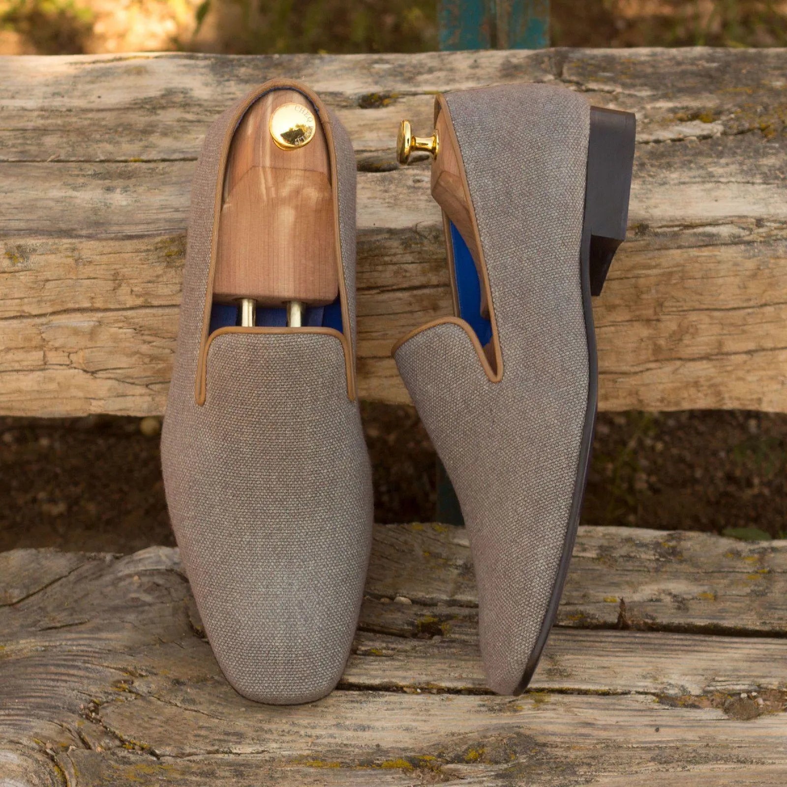 Gray Drake Slipon loafers with shoe trees, showcasing luxury bespoke shoes for men