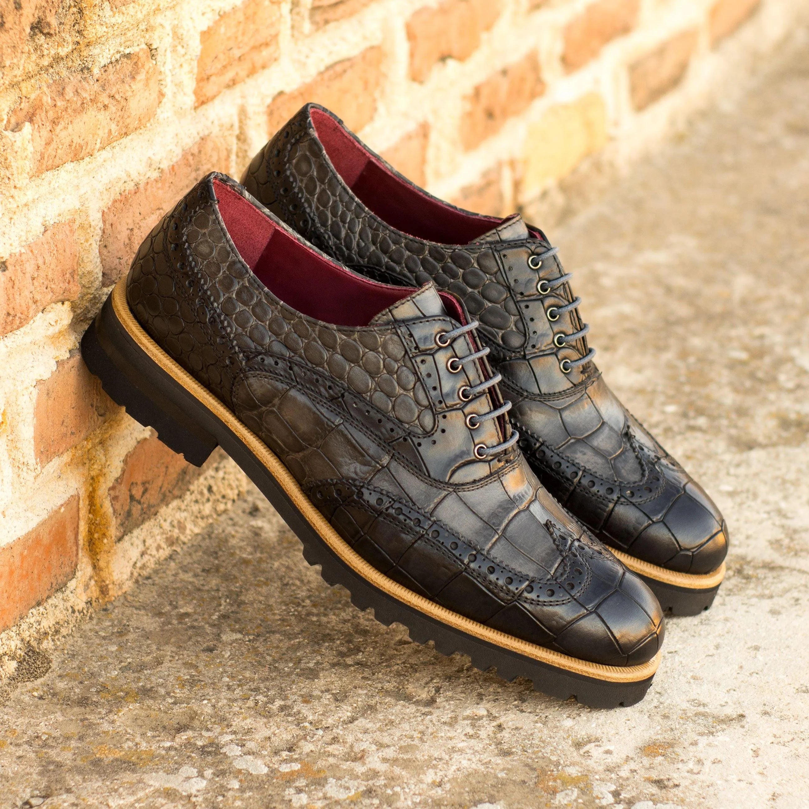 Black crocodile leather wingtip shoes from Leima Ladies in embossed calf leather