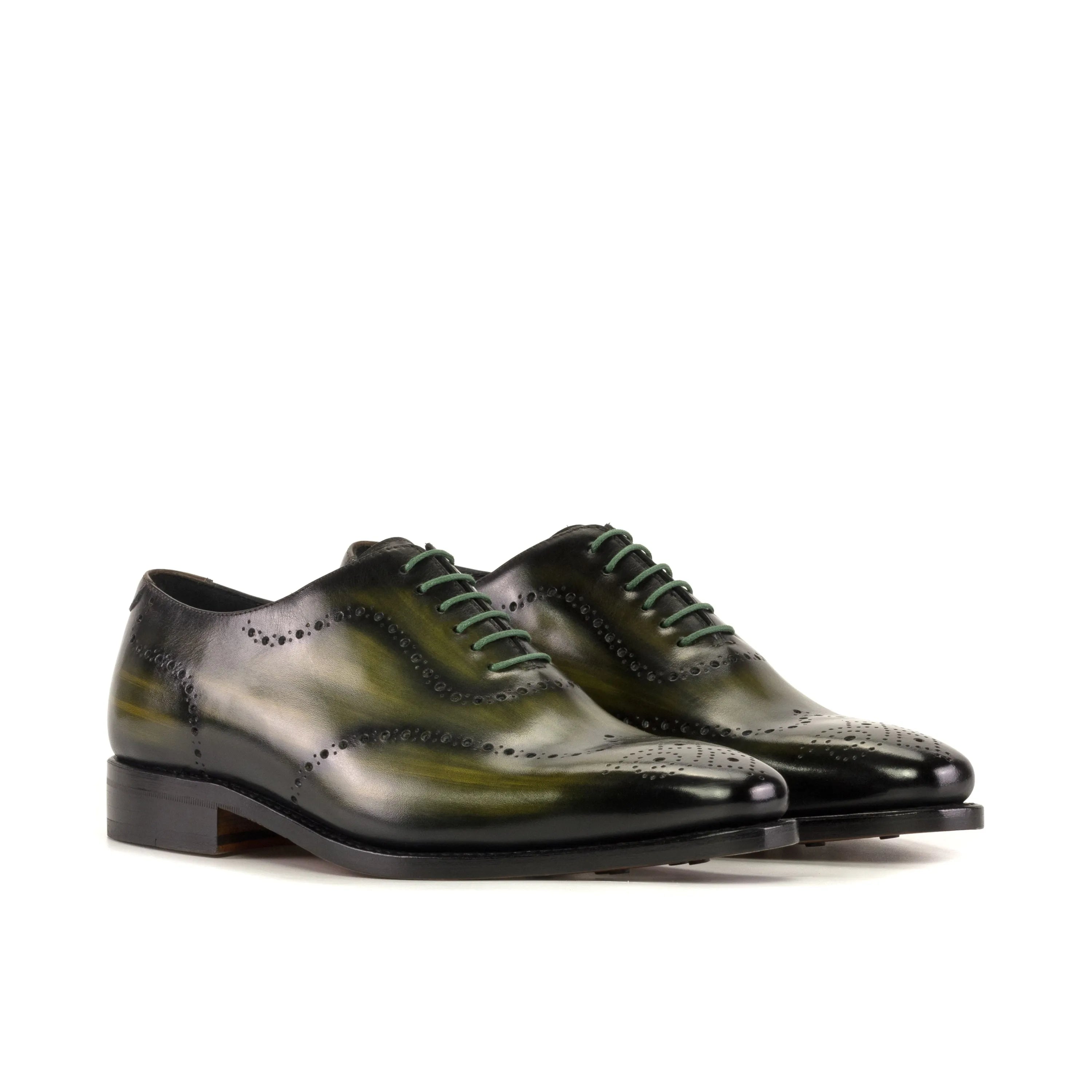 Green leather Lequa Wholecut Patina shoes offering stylish elegance for formal occasions
