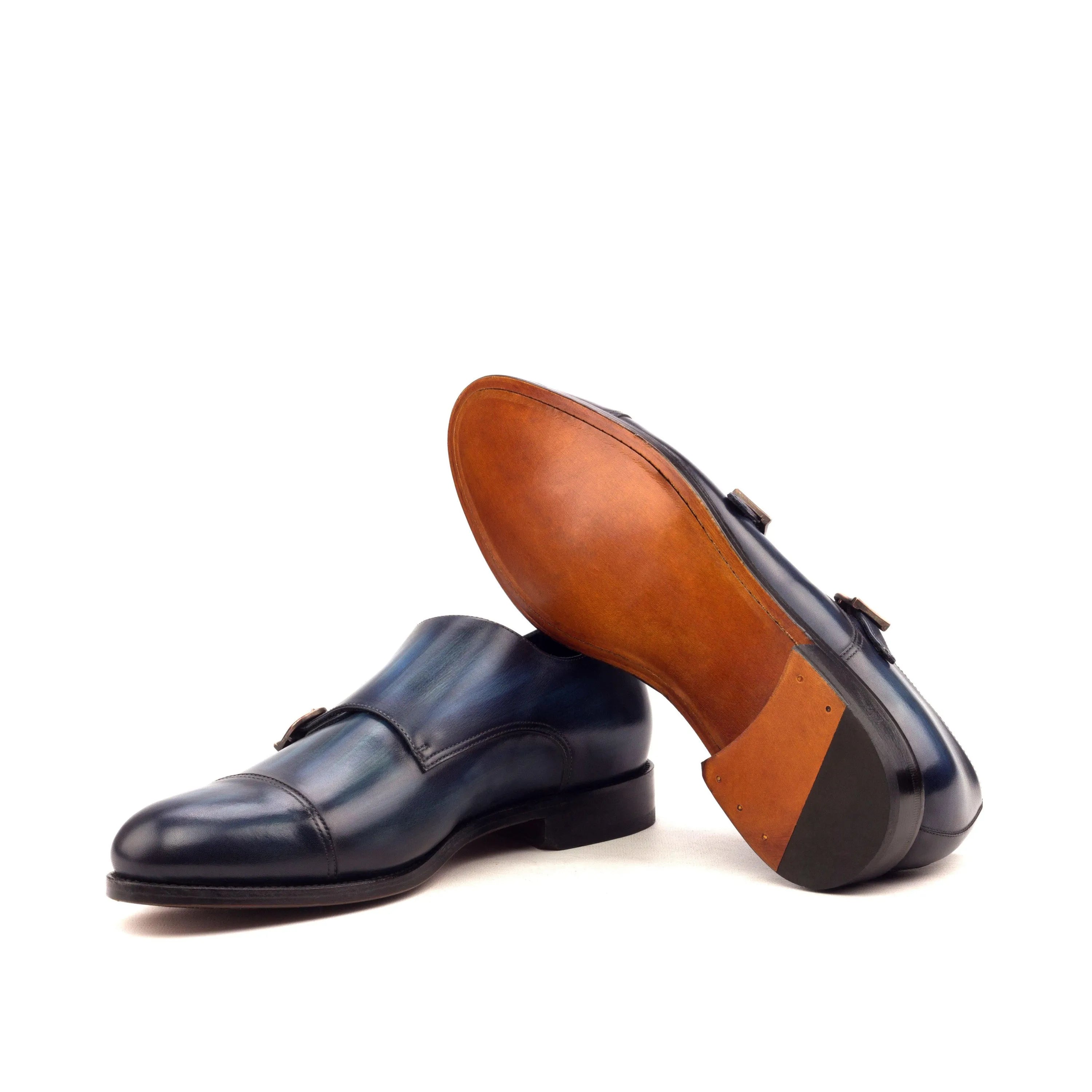 Pair of blue leather monk strap shoes from LH Double Monk featuring elegant monk patina