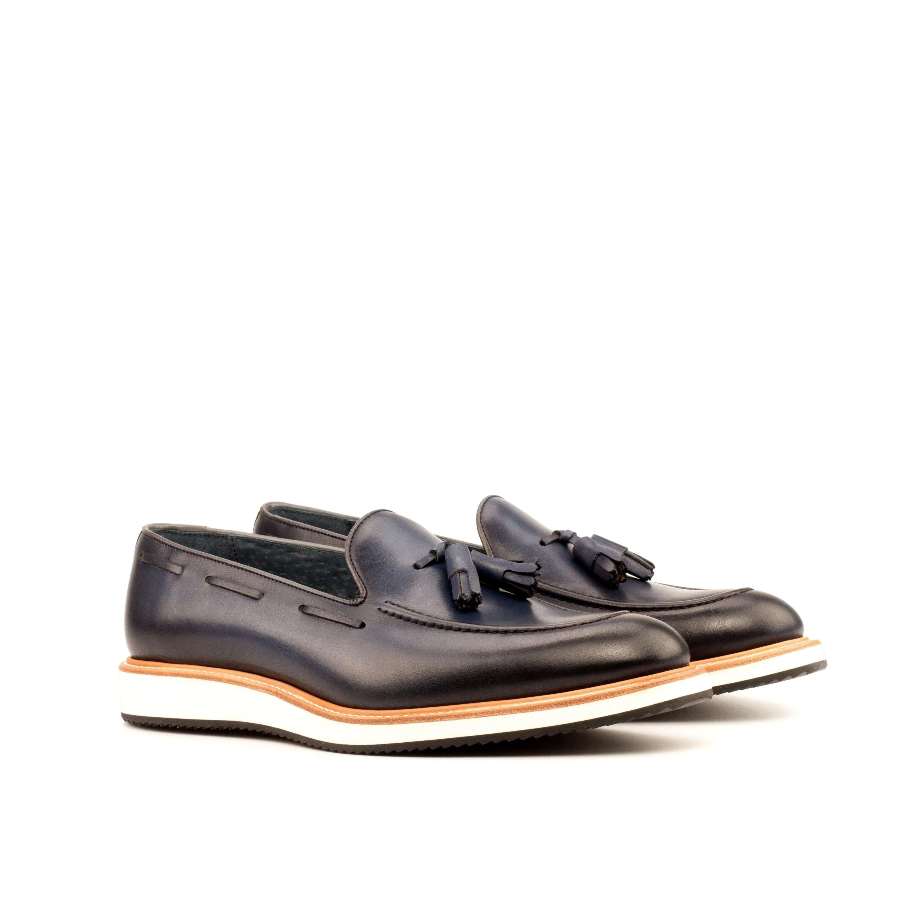 Pair of navy leather tassel Lodino Loafers II featuring painted calf and rounded toe design