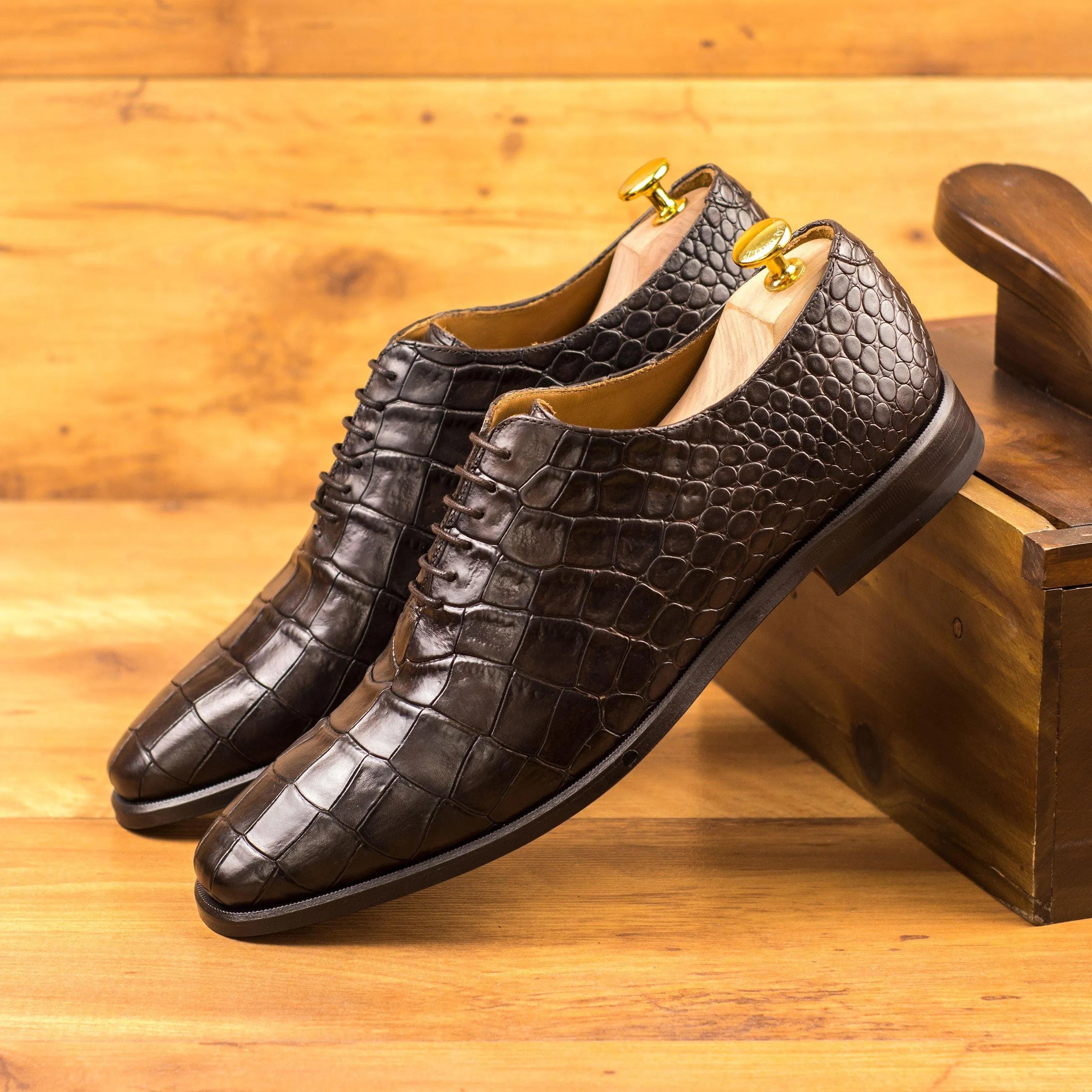 Pair of black crocodile leather dress shoes from the Luciano Croc Wholecut collection