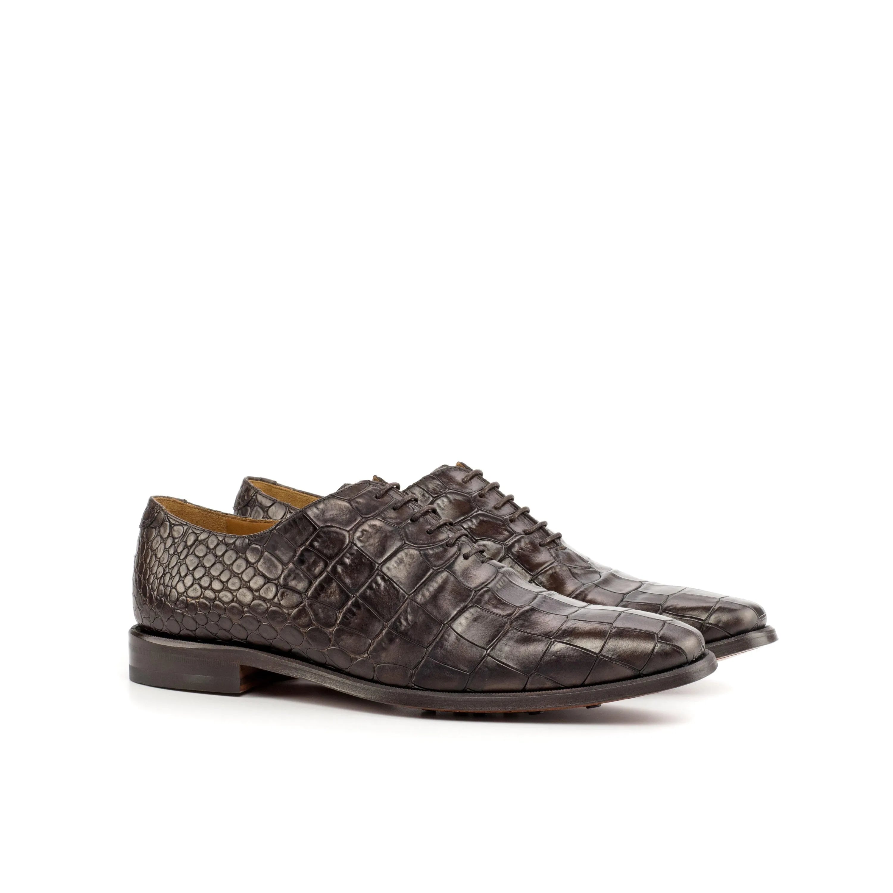 Pair of black crocodile leather dress shoes from the Luciano Croc Wholecut collection