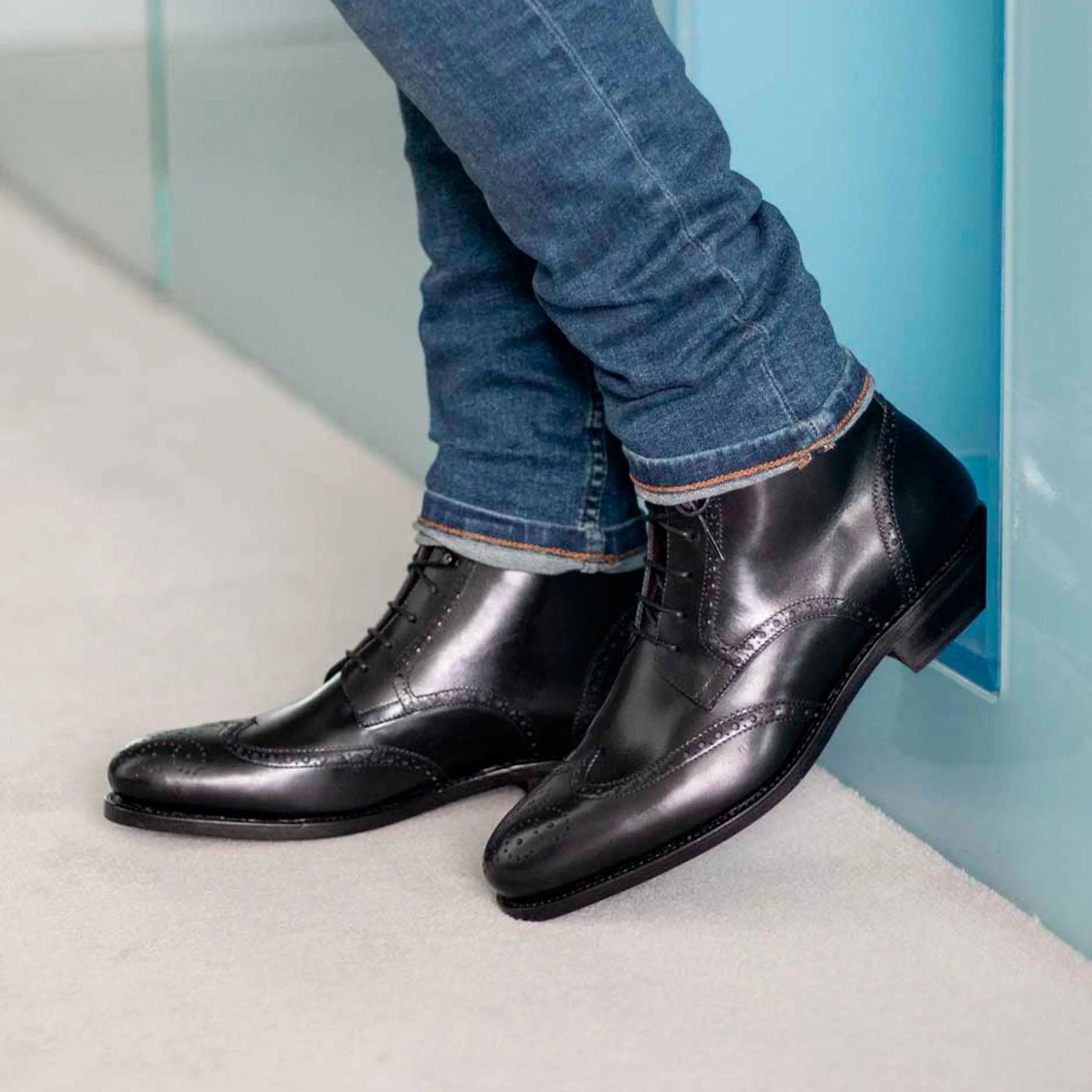 Black leather wingtip boots named Luis Military Brogue Boots for stylish footwear