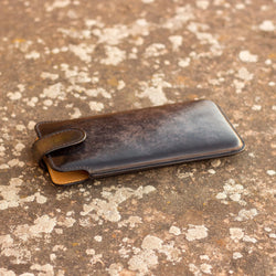 Lux Phone Case 2 in a leather design showcasing unique savoir-faire and rich patina