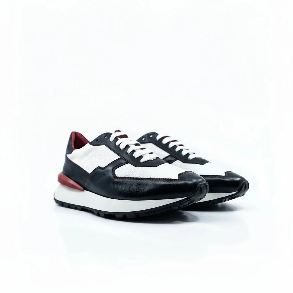 M10 Chunky Tempo Trainer: black and white Italian leather sneakers with red accents
