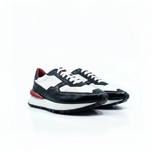 M10 Chunky Tempo Trainer: black and white Italian leather sneakers with red accents
