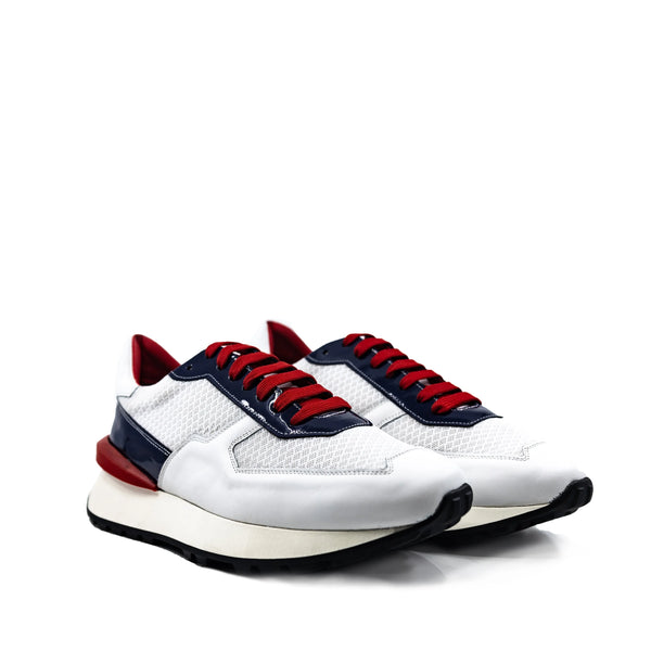 M9 Chunky Tempo Trainer: white leather sneaker with red navy accents