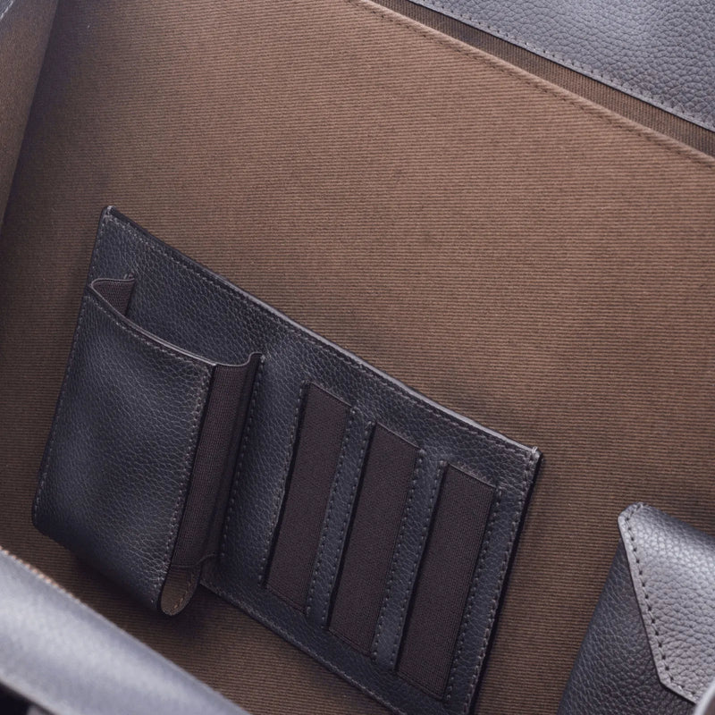 Dark leather wallet with card slots for Machino Briefcase showcasing unique savoir-faire