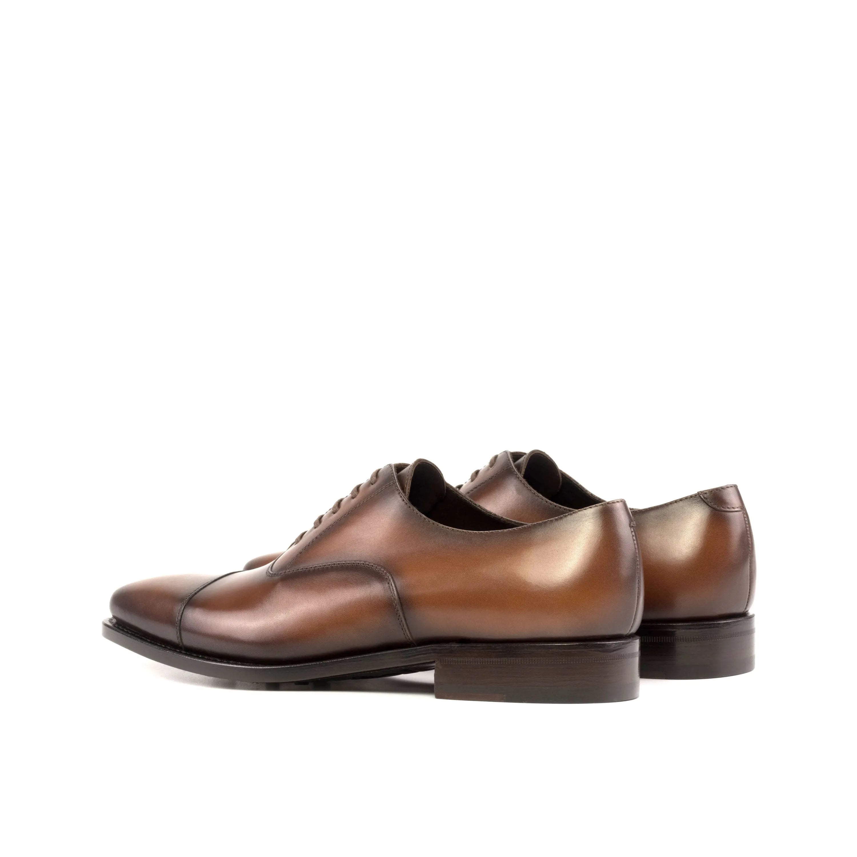 Brown leather dress shoes from Mady Oxford, perfect for the fast lane lifestyle