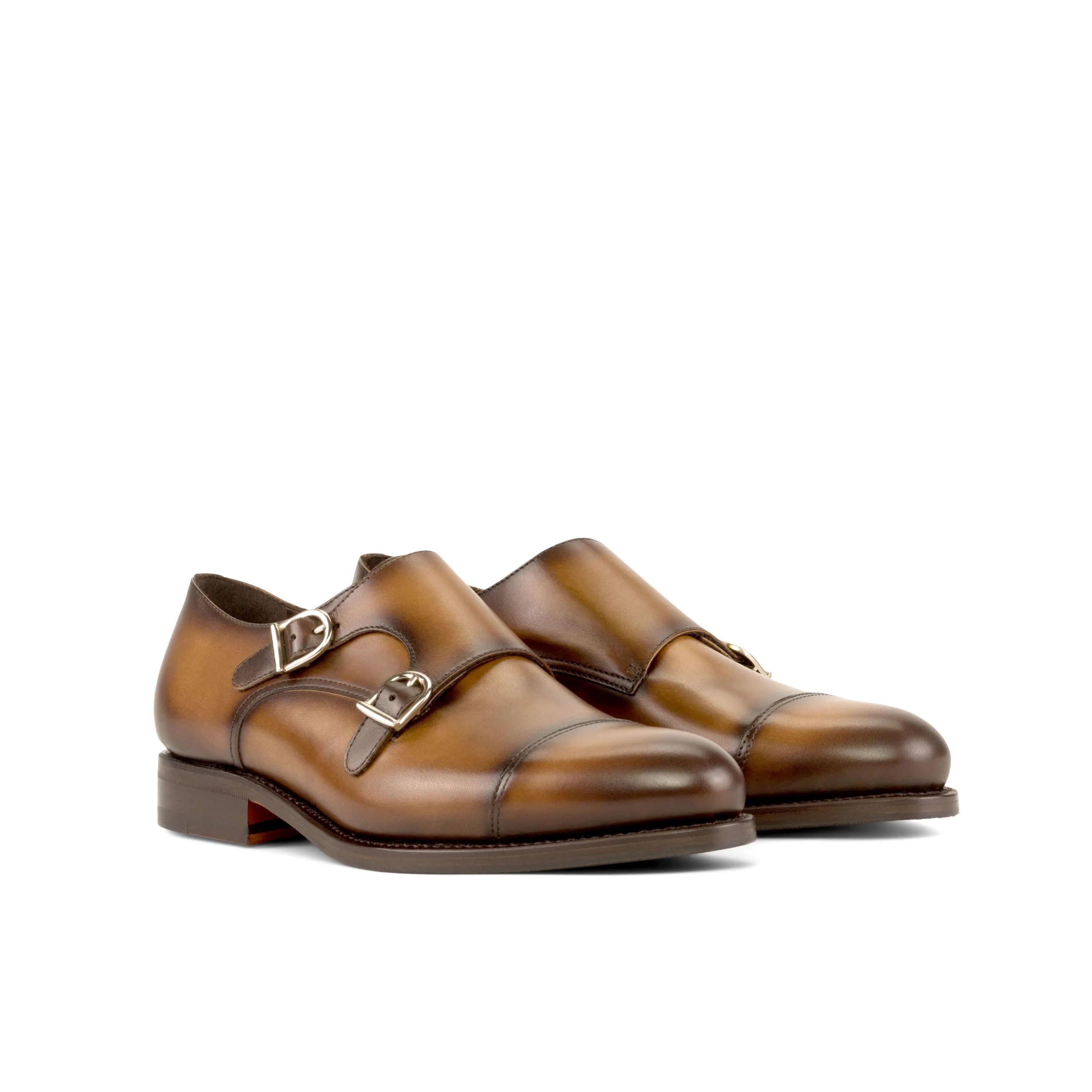 Brown leather Majesty Double Monk shoes featuring a stylish double monk strap design