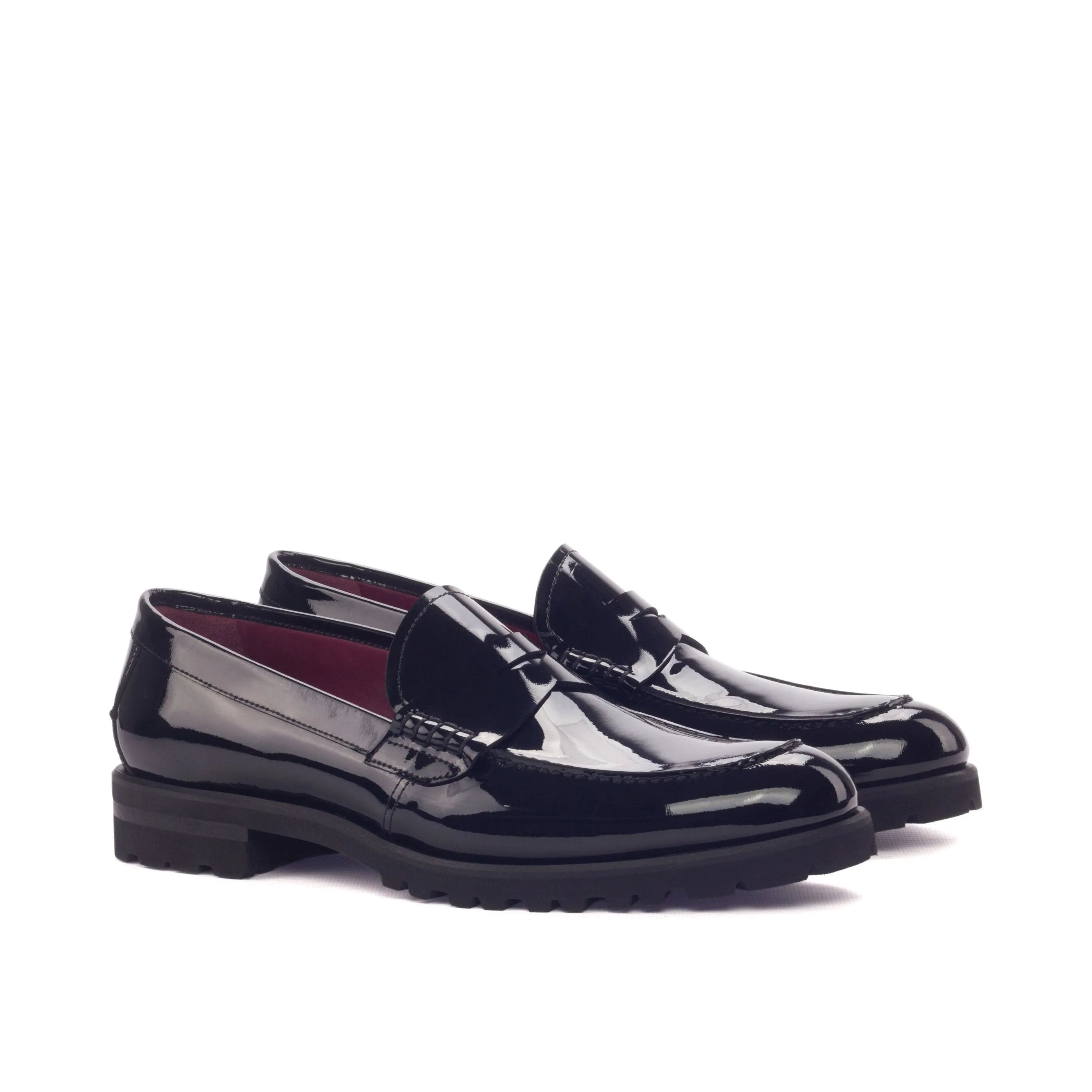 Pair of shiny black Marina Ladies Loafers elegantly showcased for stylish footwear choice