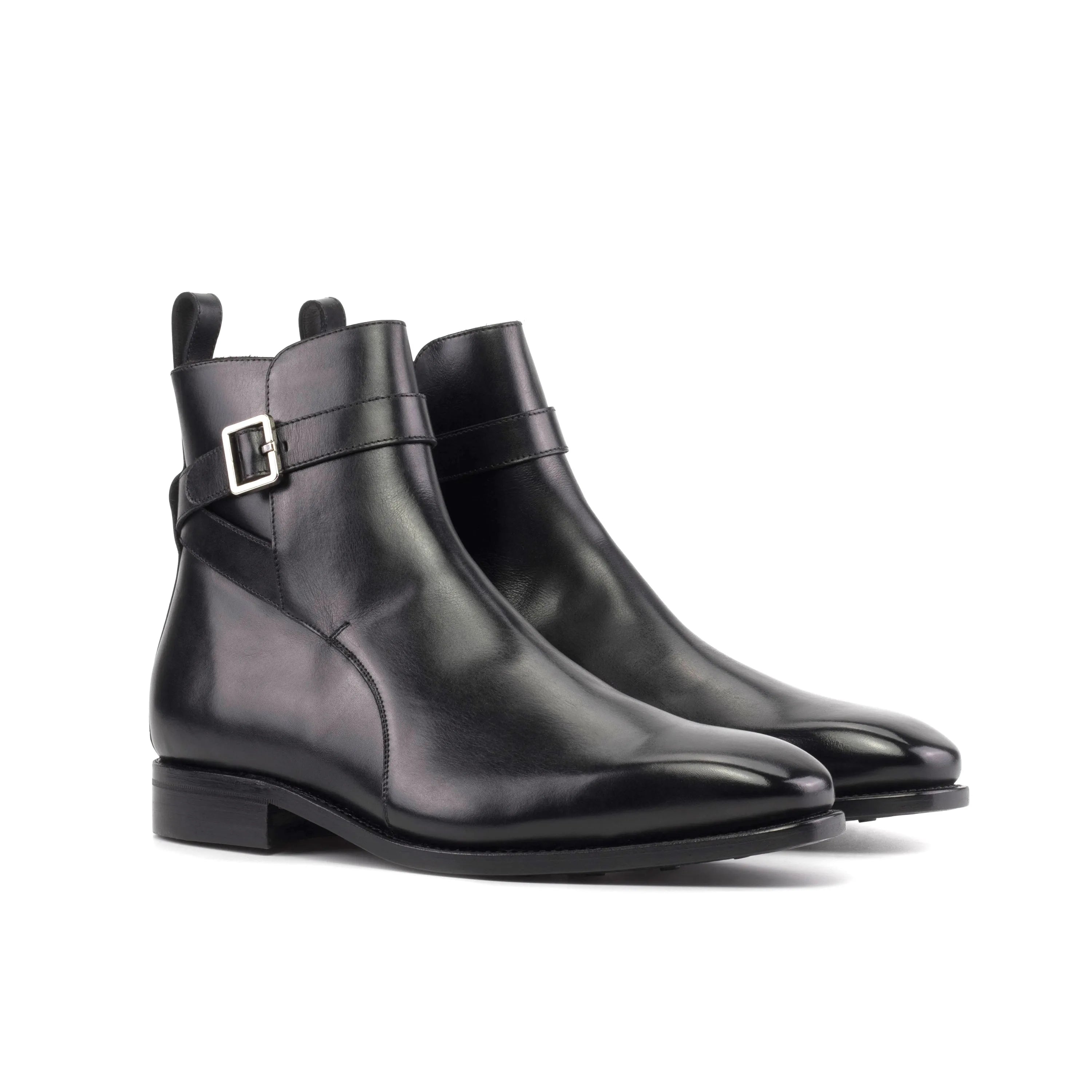 Pair of black leather buckle Martys Jodhpur Boots showcasing modern elegance