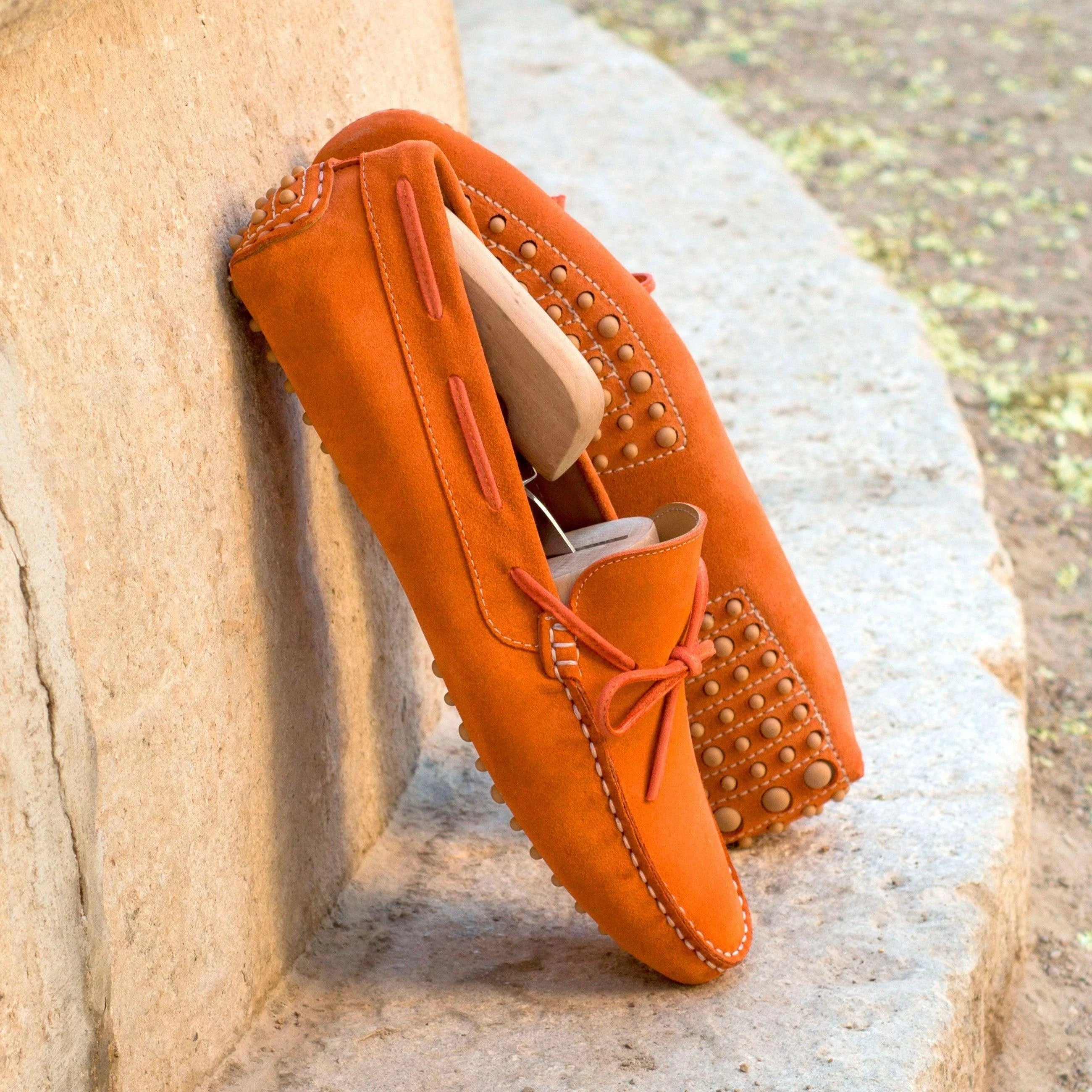 Maryland Driver II orange suede loafers with studded bow tie closure