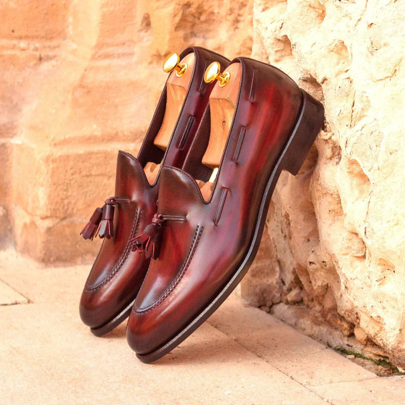 Burgundy leather tassel loafers from the MDF Patina collection, showcasing exquisite craftsmanship