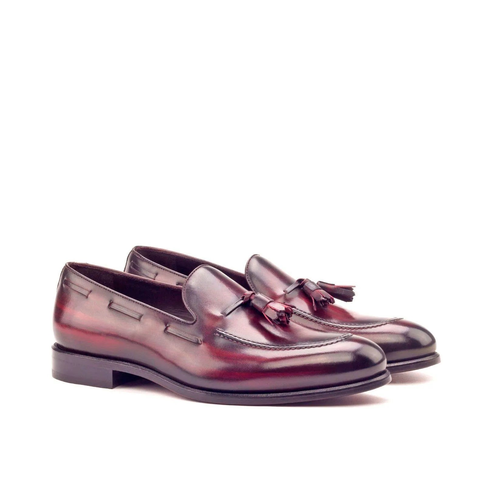 Burgundy leather tassel loafers showcasing MDF Patina loafers with elegant craftsmanship