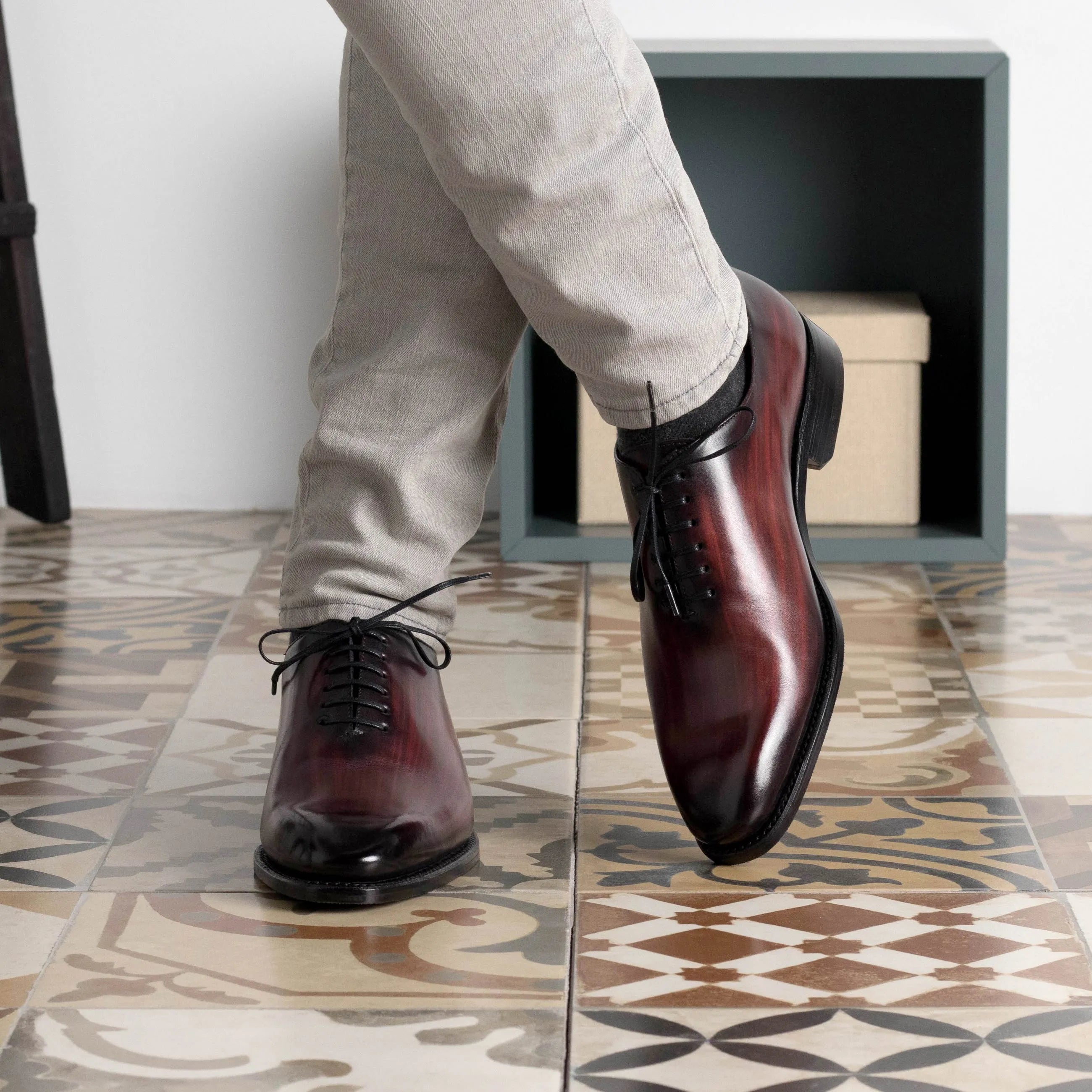 Burgundy leather Mercure Patina Wholecut shoes showcasing elegant craftsmanship